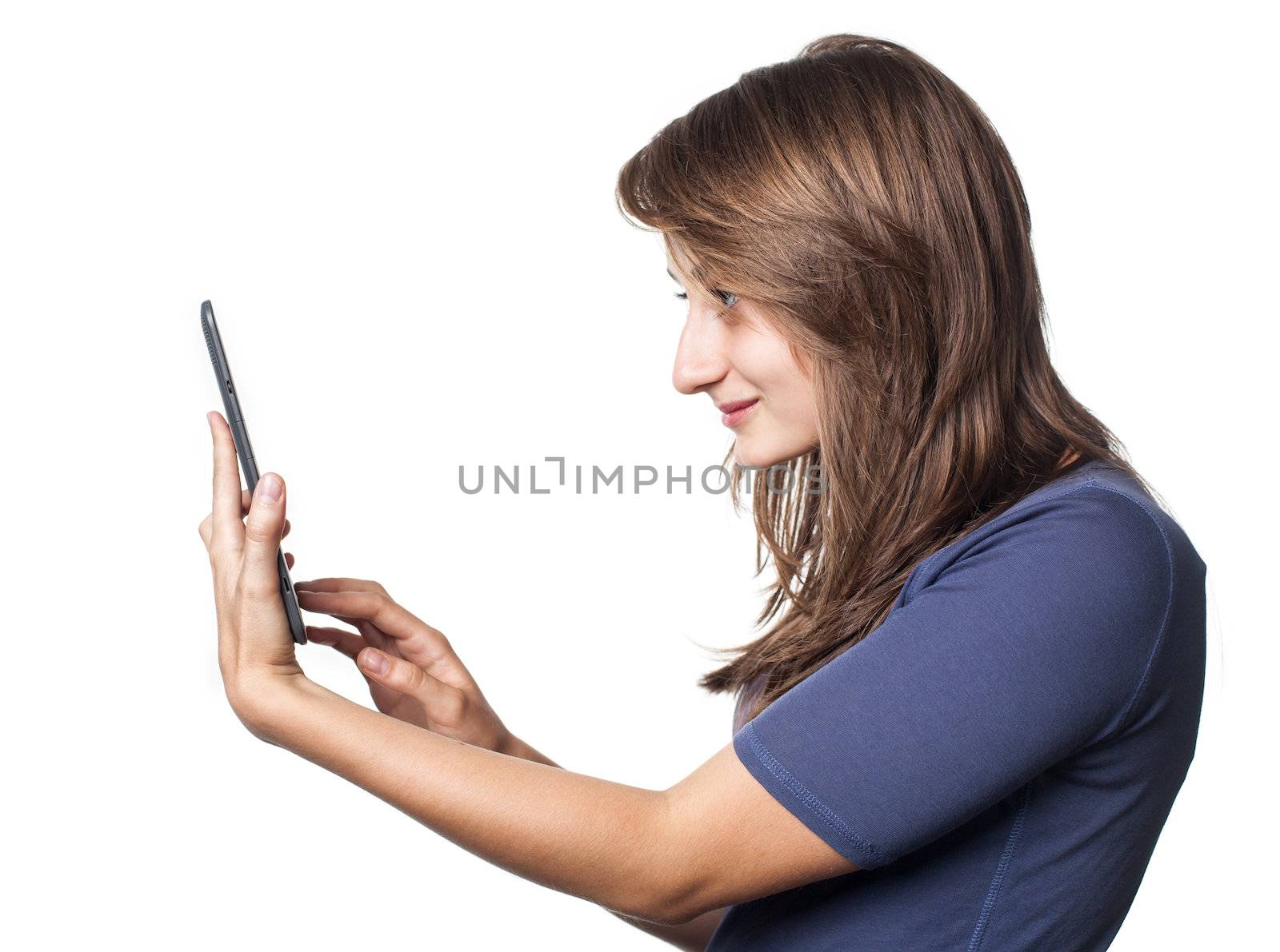 Young woman reading e-book device