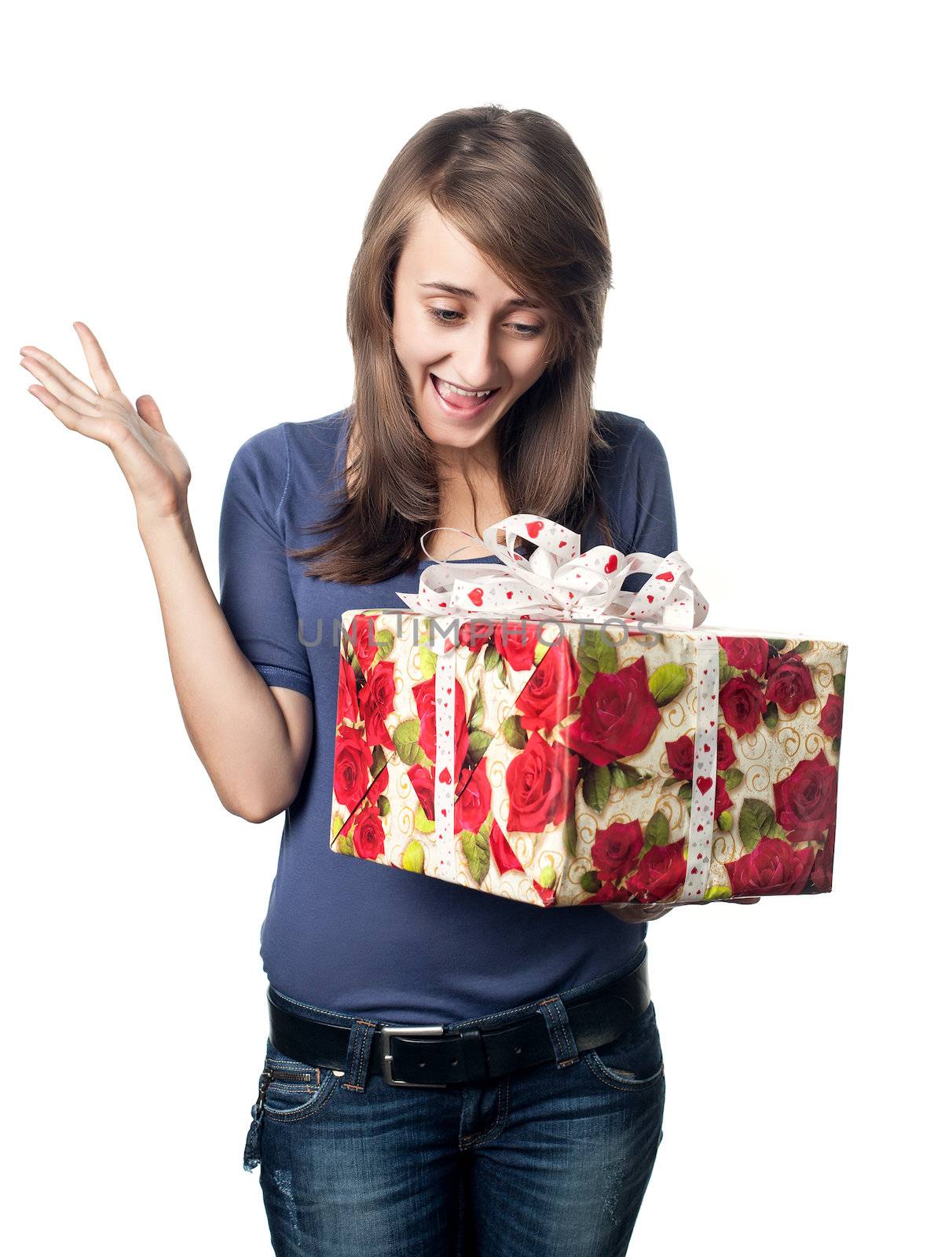 happy young woman holding a gift box