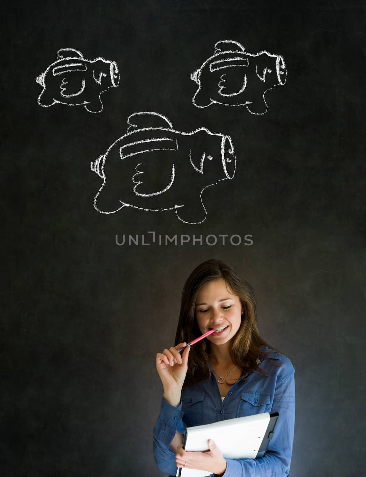 Businesswoman, student or teacher with chalk piggy banks concept by alistaircotton