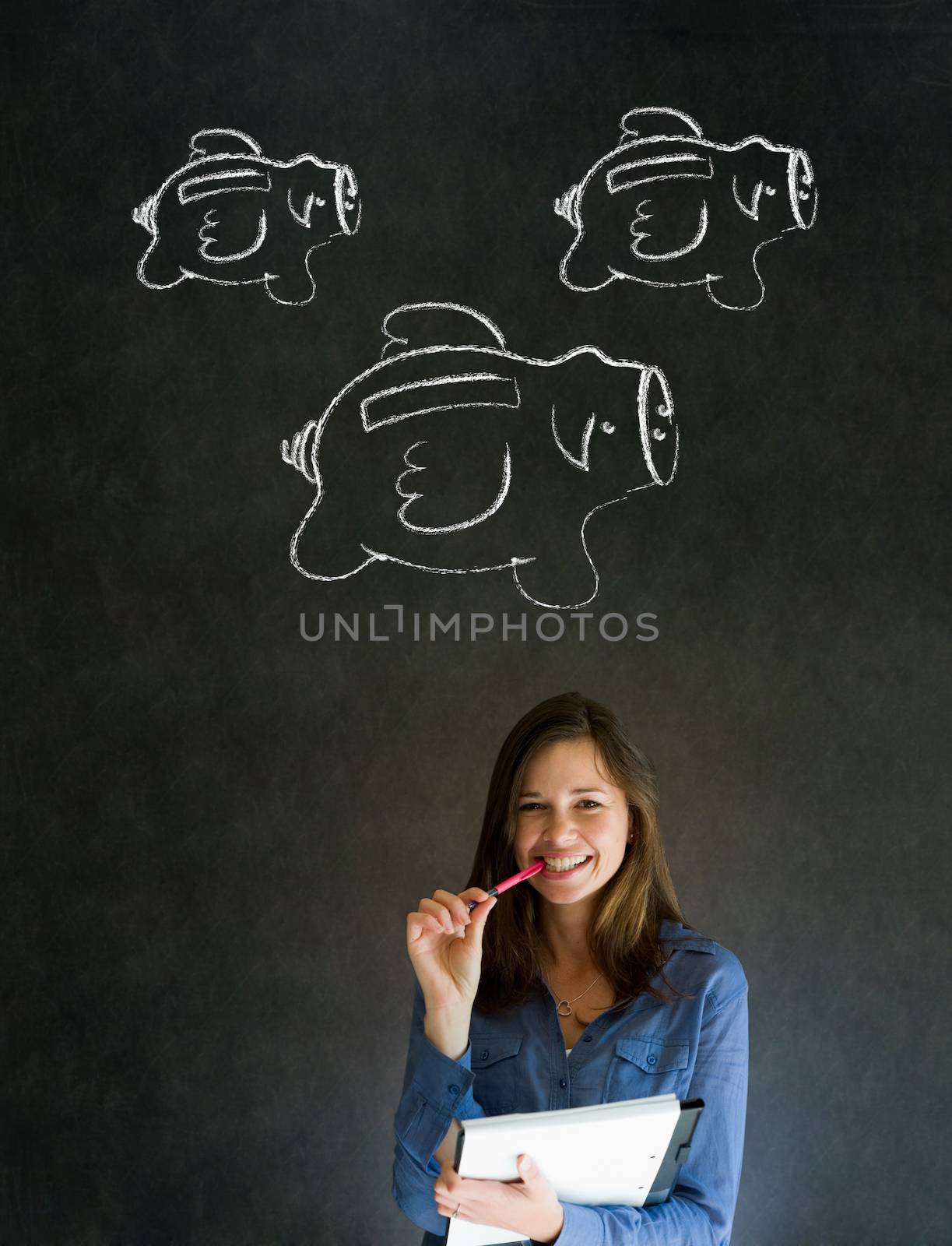 Businesswoman, student or teacher with chalk piggy banks concept by alistaircotton