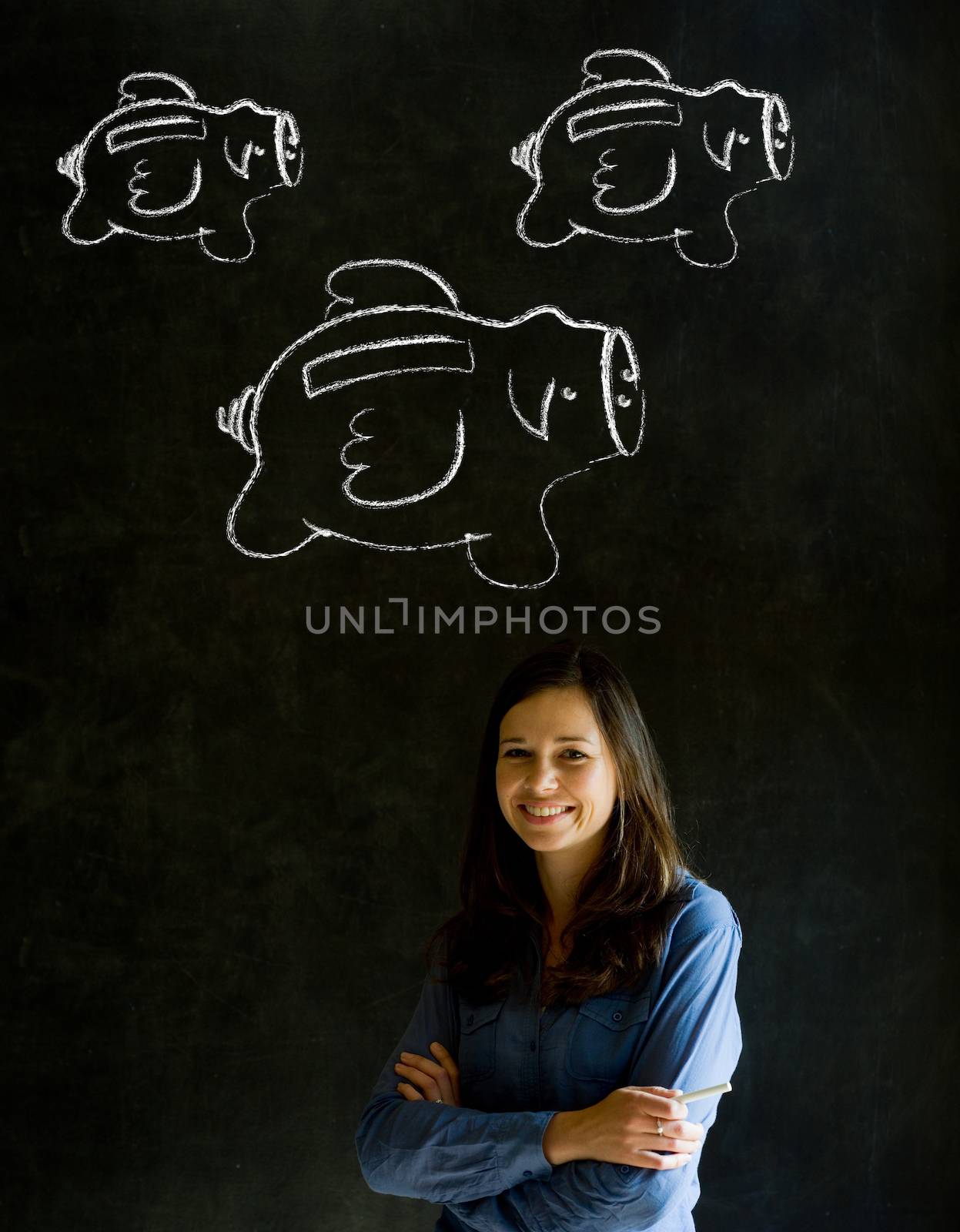 Businesswoman, student or teacher with chalk piggy banks concept by alistaircotton