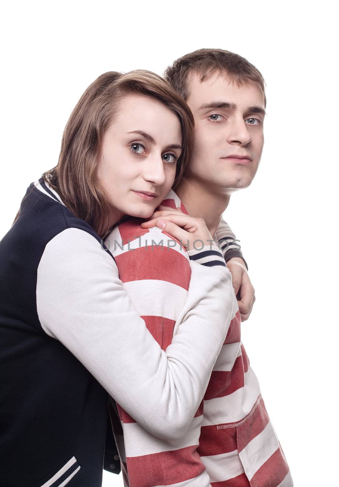 Portrait of a girl with a young man isolated on white. Focus on girl
