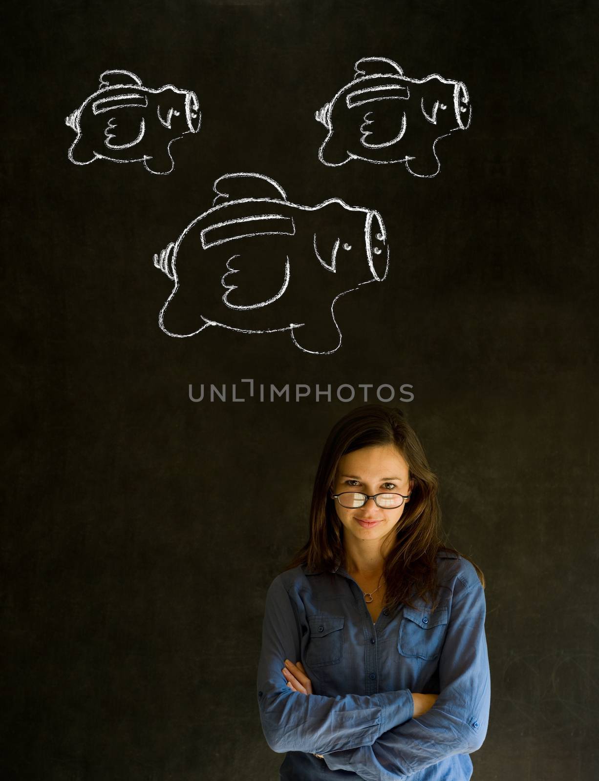 Businesswoman, student or teacher with chalk piggie banks  concept blackboard background