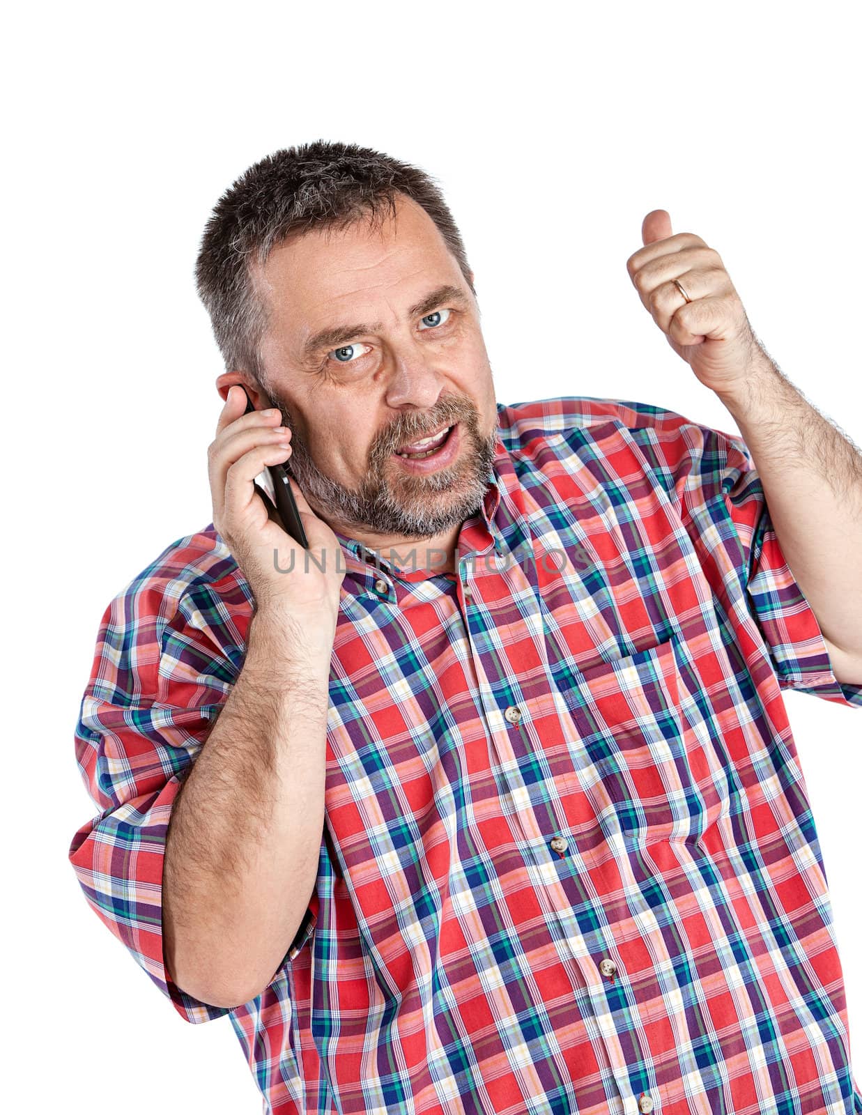 Happy middle-aged man speaks on a mobile phone and gesturing. Isolated on white