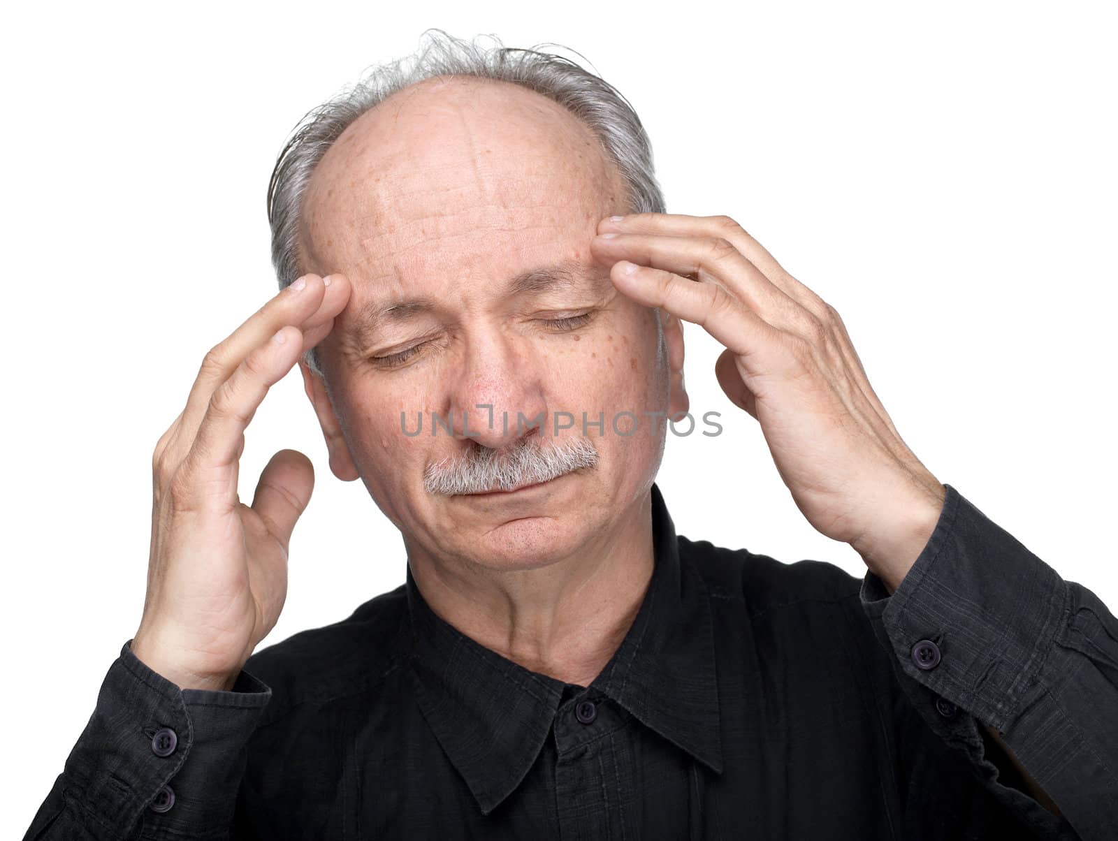 Elderly man suffering from a headache isolated on white