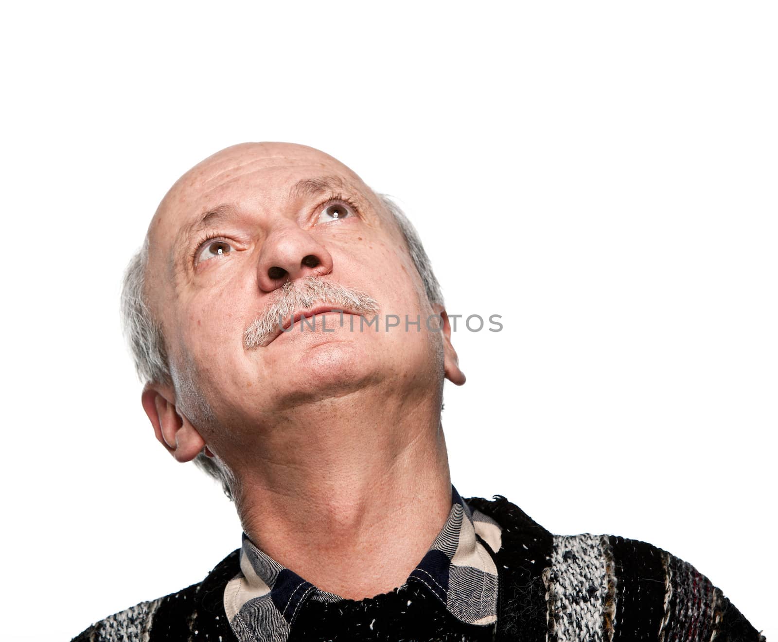 mature man looking up isolated on white