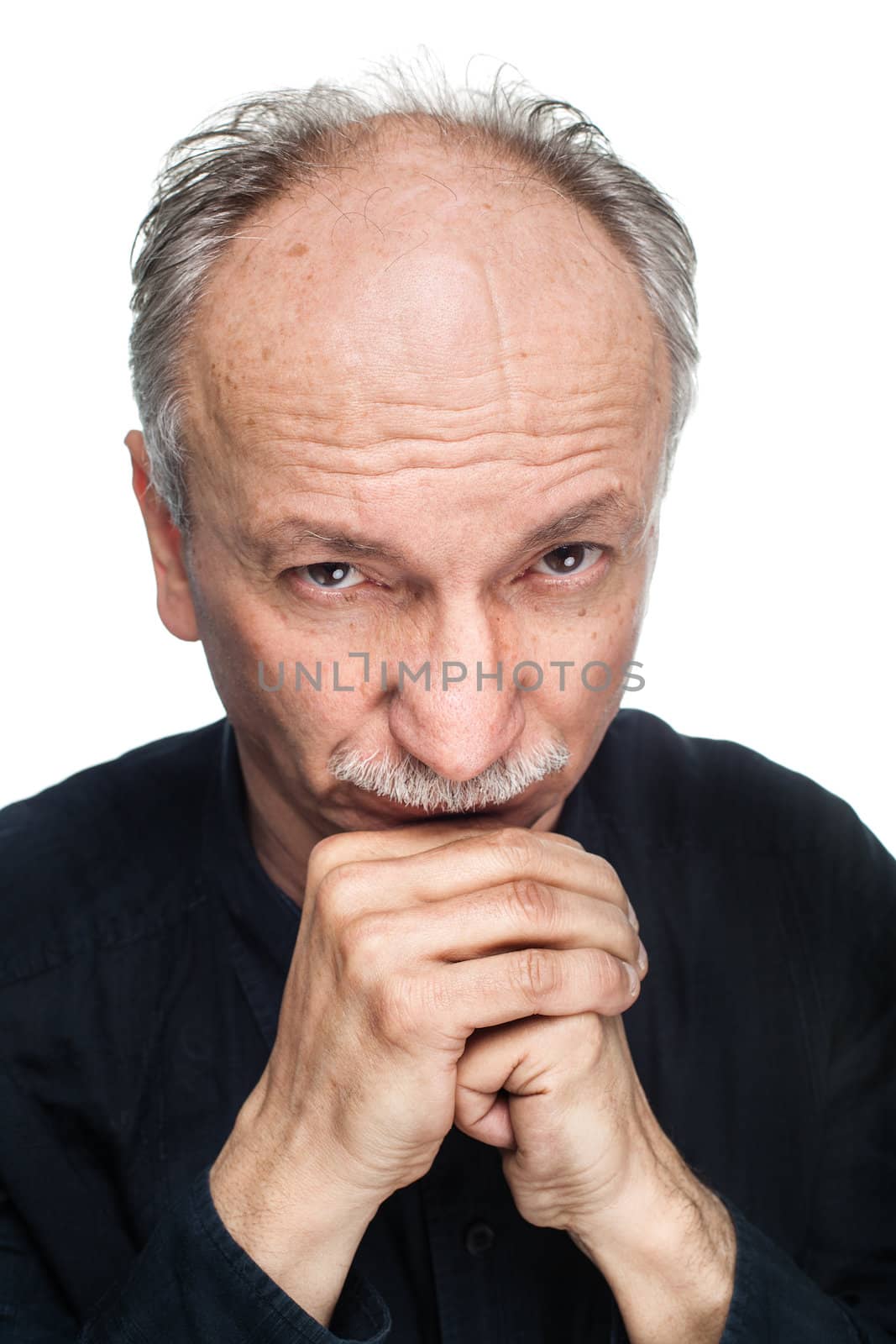 Portrait of an old man on a white background