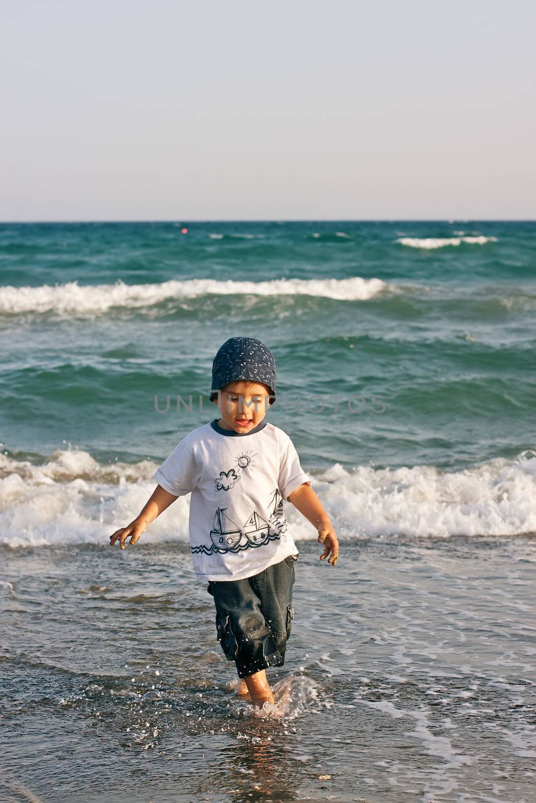 boy on the beach by palinchak