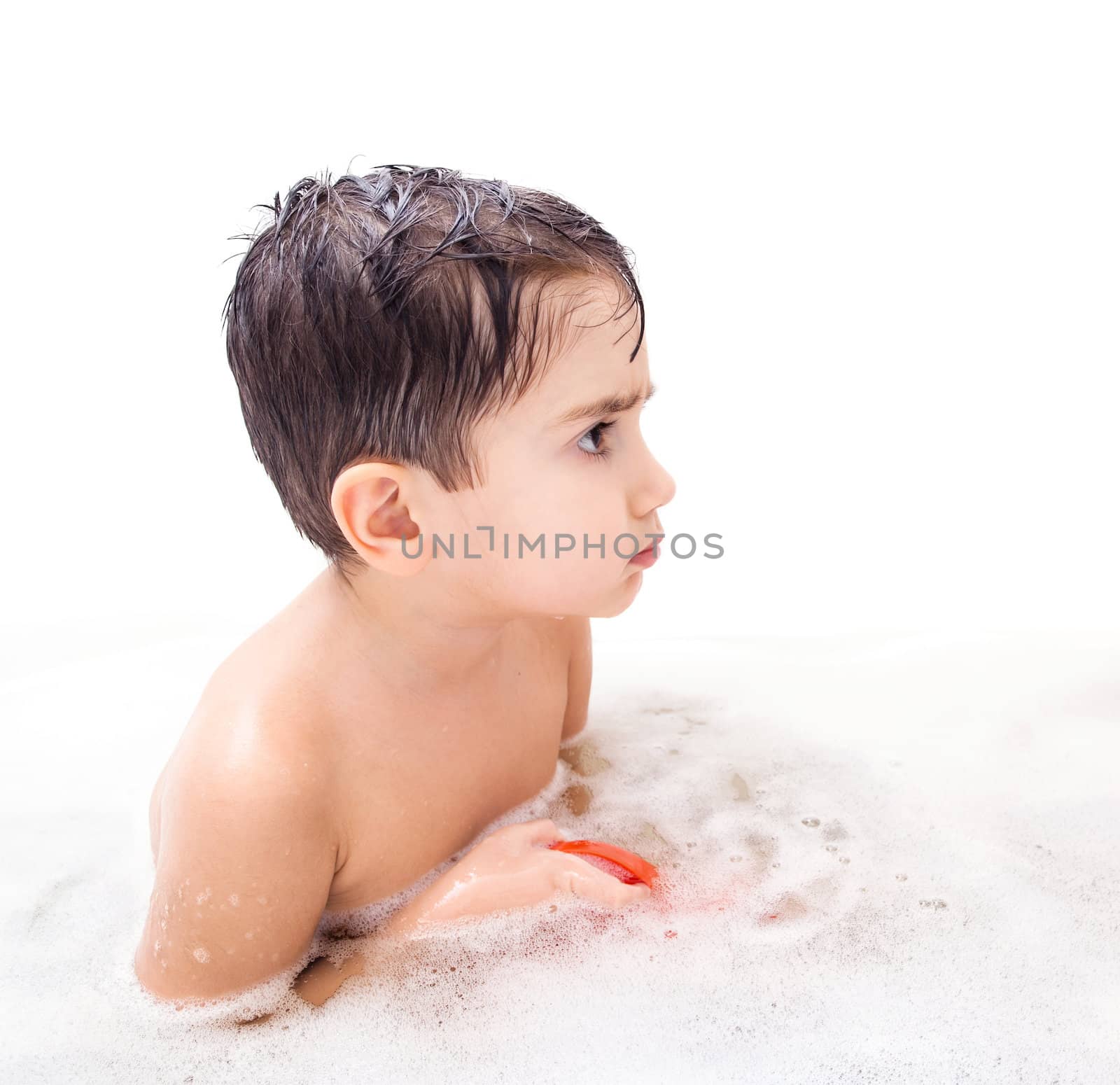 Boy washing in the bathroom