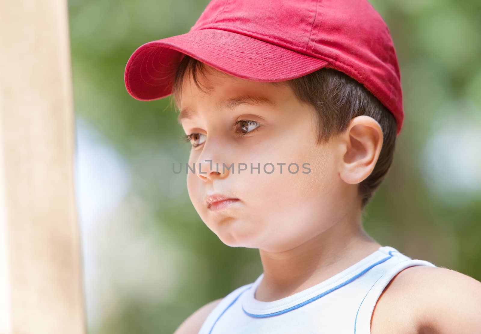 Portrait of a 3-4 years boy on the playground