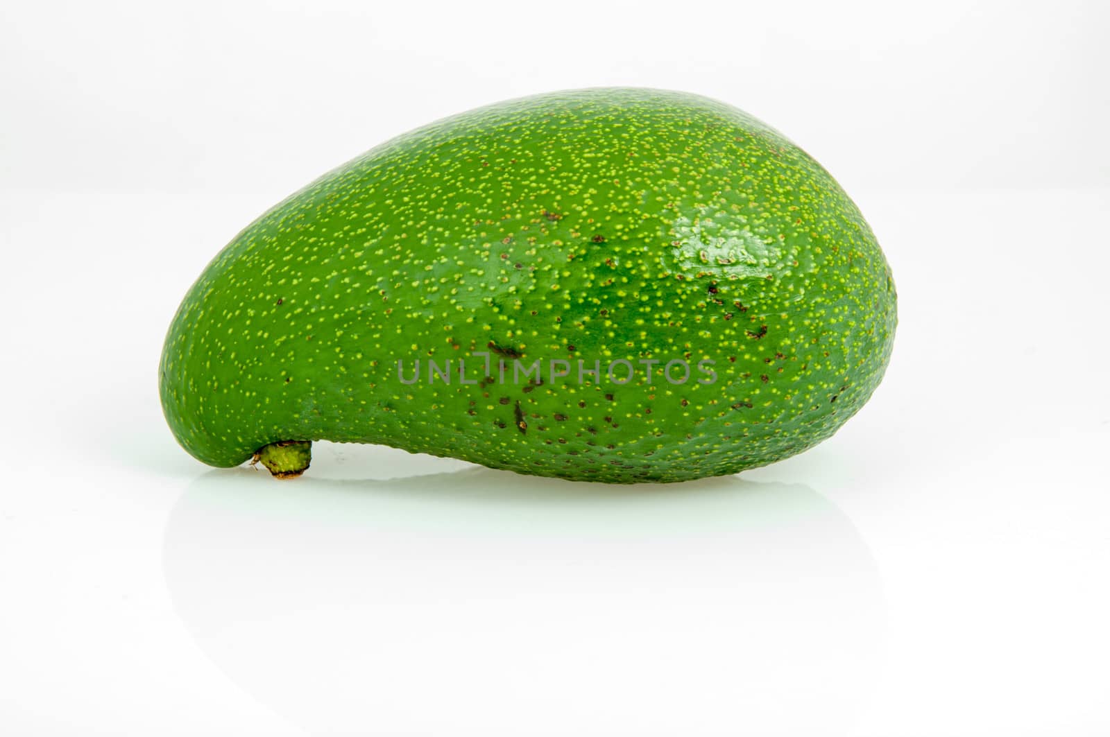 An image of avocado fruit isolated on white