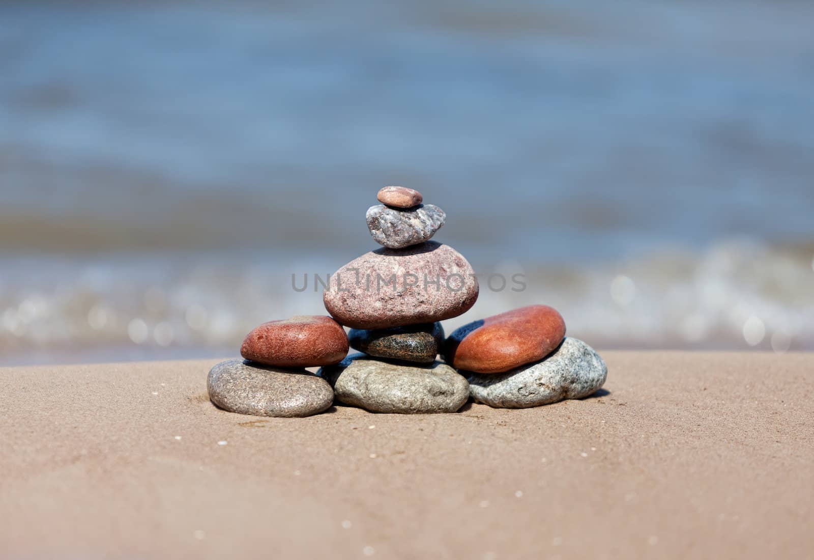 stone on sea shore closeup by palinchak