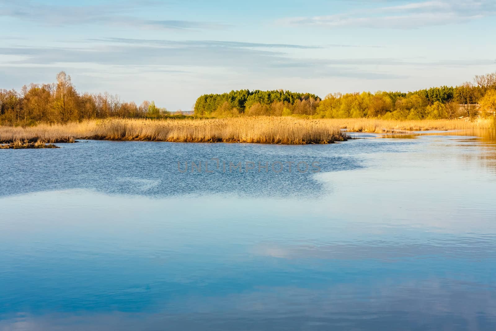 Sky And Clouds Reflection On Lake by ryhor