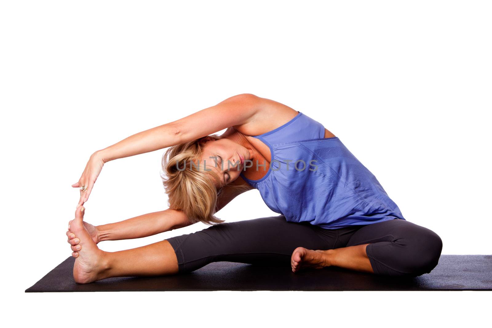 Beautiful woman Revolved Head to Knee Forward Bend Parivrtta Janu Sirsasana in yoga stretching, on white.