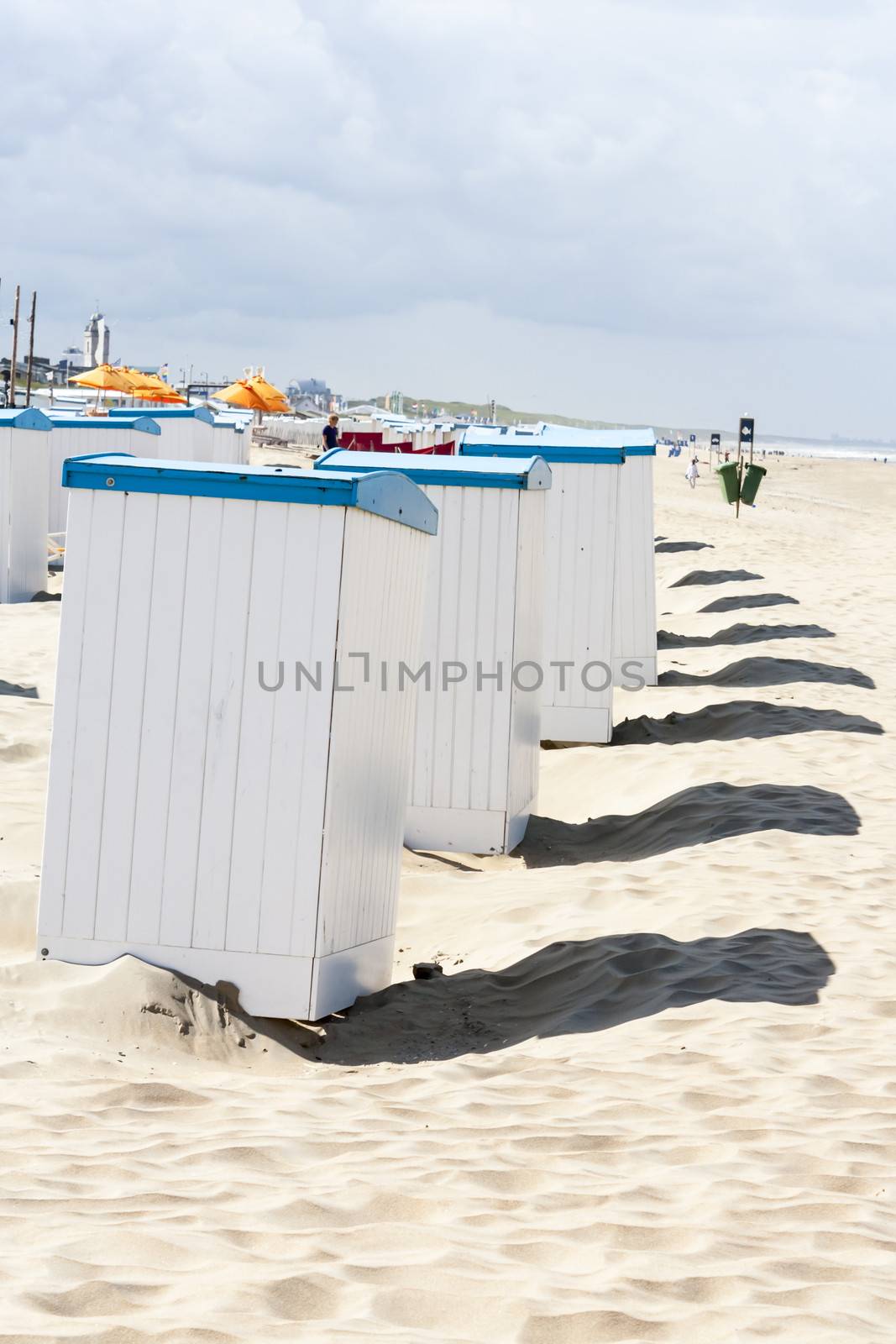 Beach huts along the North Sea in the Netherlands by Tetyana