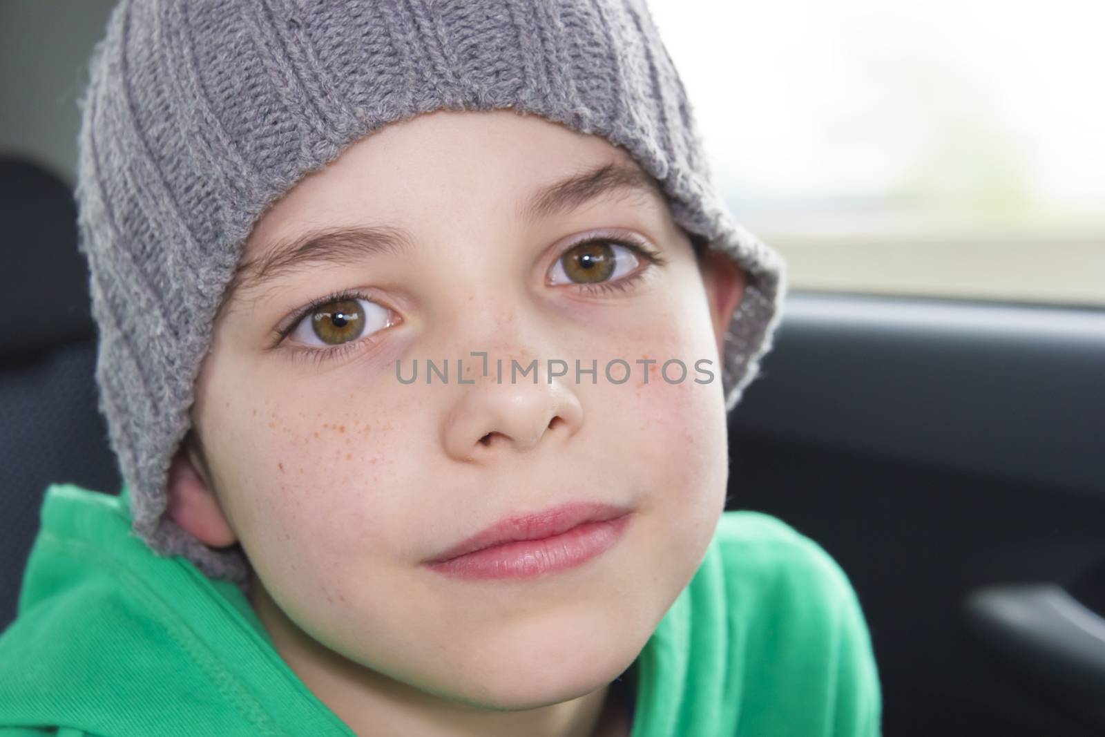 closeup of cute young eleven years boy by Tetyana