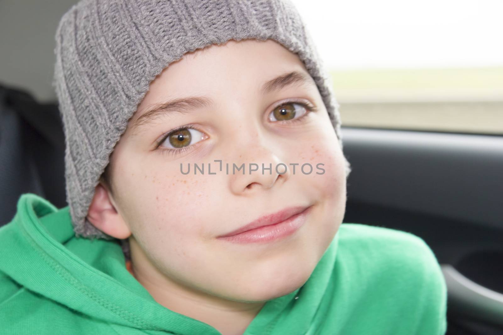 closeup of cute young eleven years boy by Tetyana