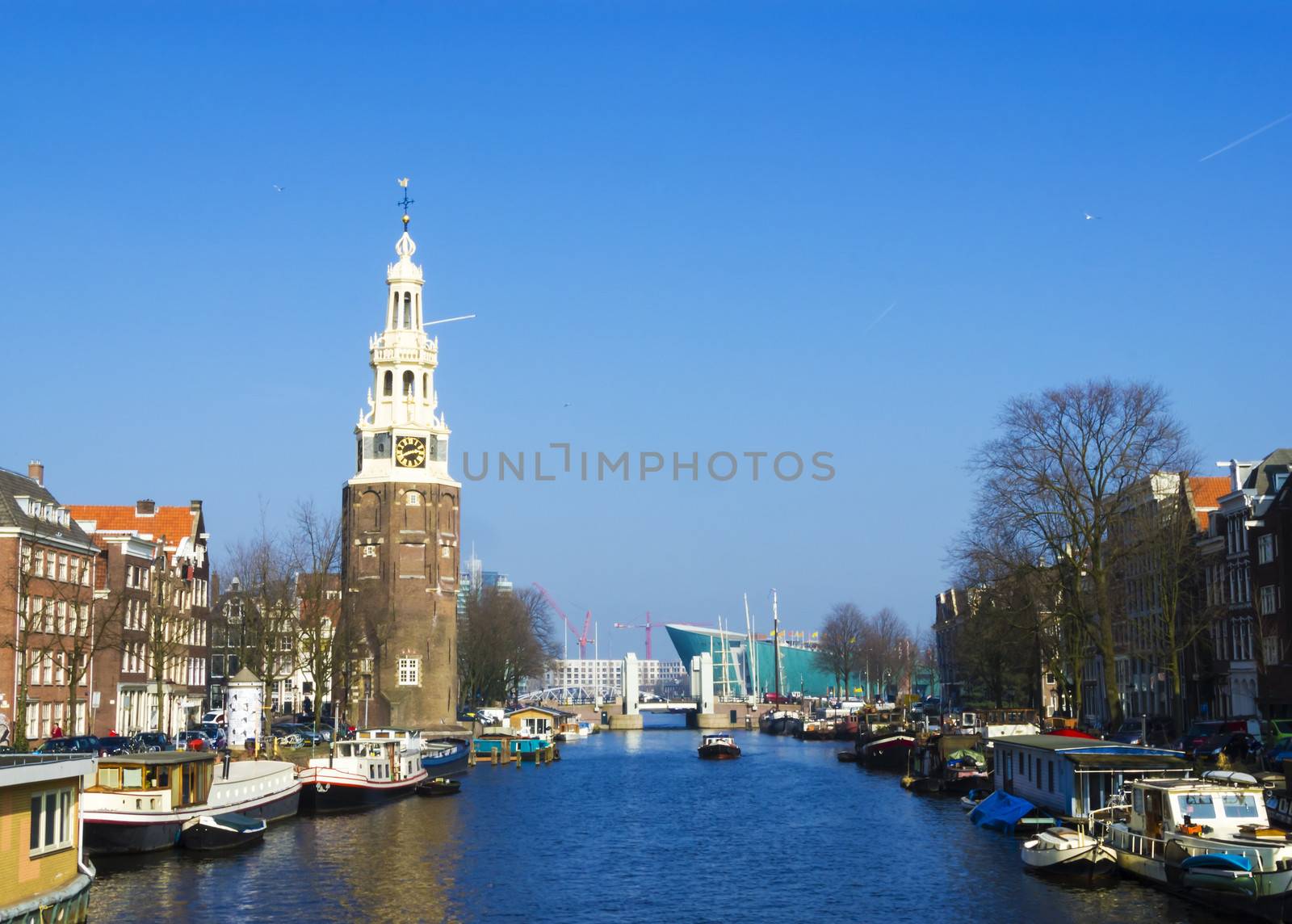 Classical Amsterdam view on a canal, the Netherlands by Tetyana