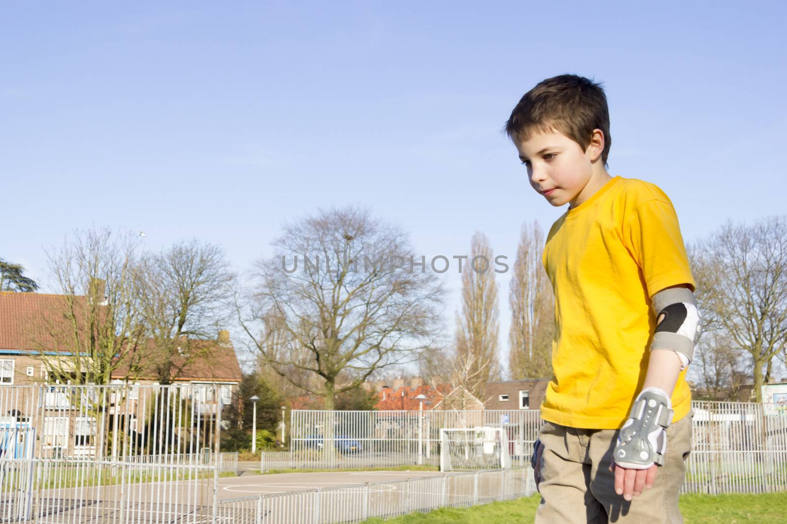 Shot of smiling sliding rollerskaters in protection kit