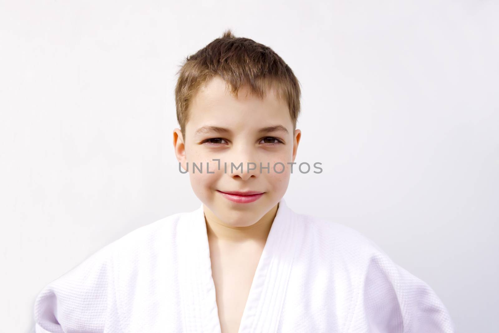 portrait of cute young teen boy in kimono