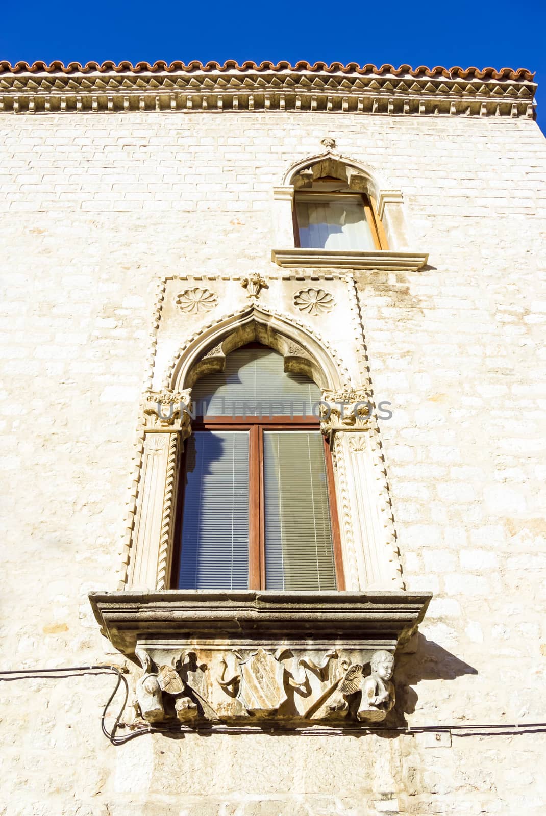 Ancient window, Zadar, Croatia by Tetyana
