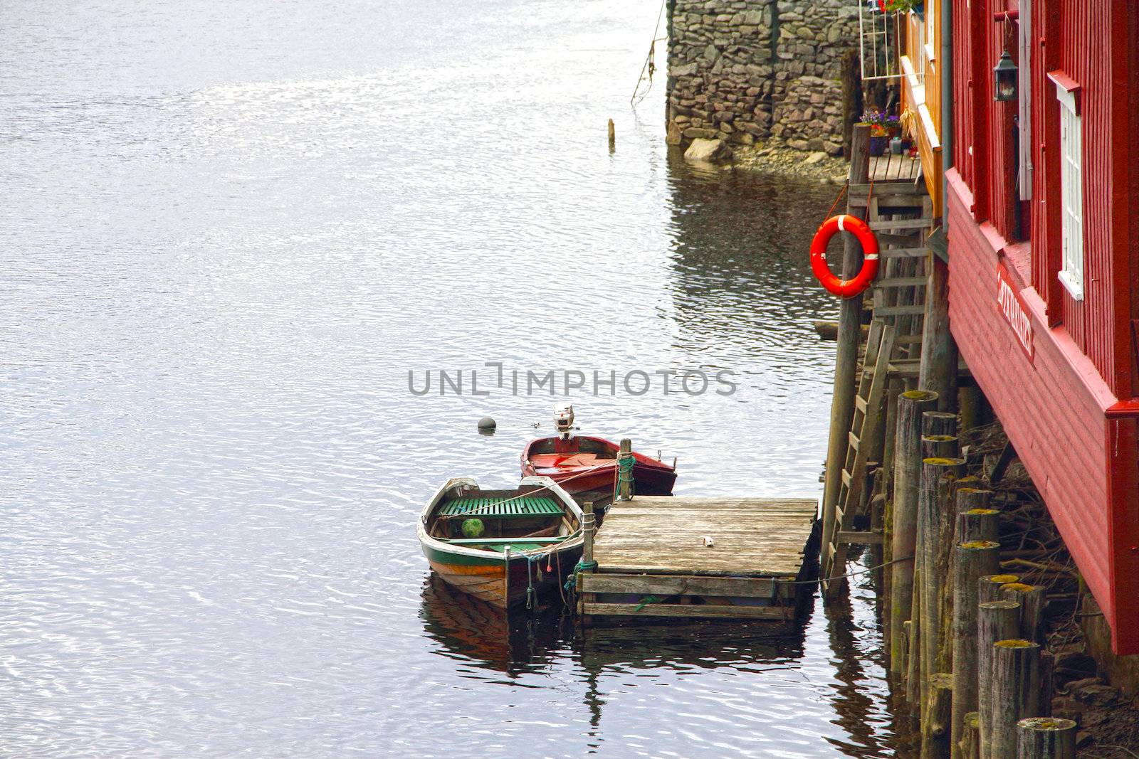 Cityscape of Trondheim, Norway with old houses on embankment