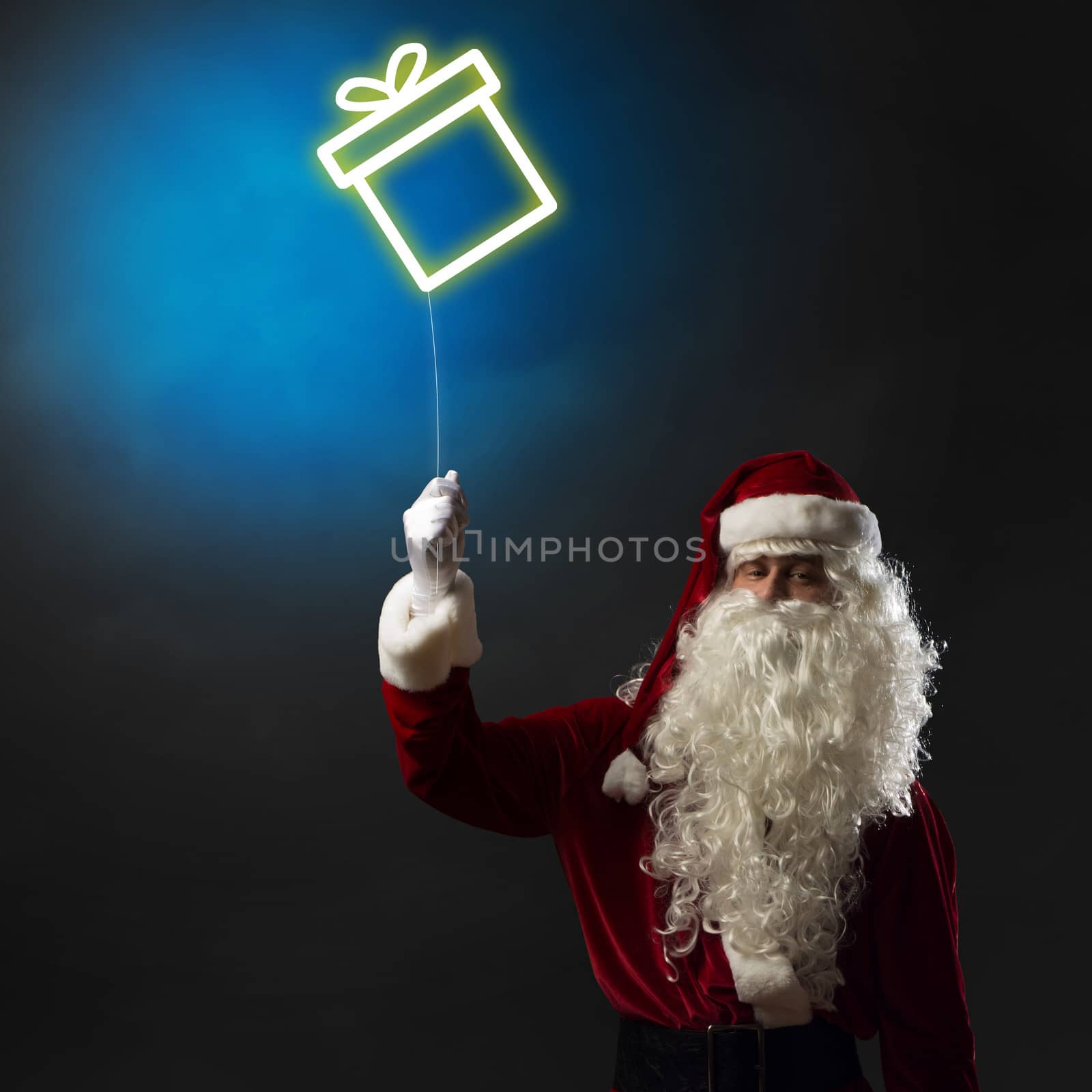 Santa holding a light symbol of the Christmas box by adam121