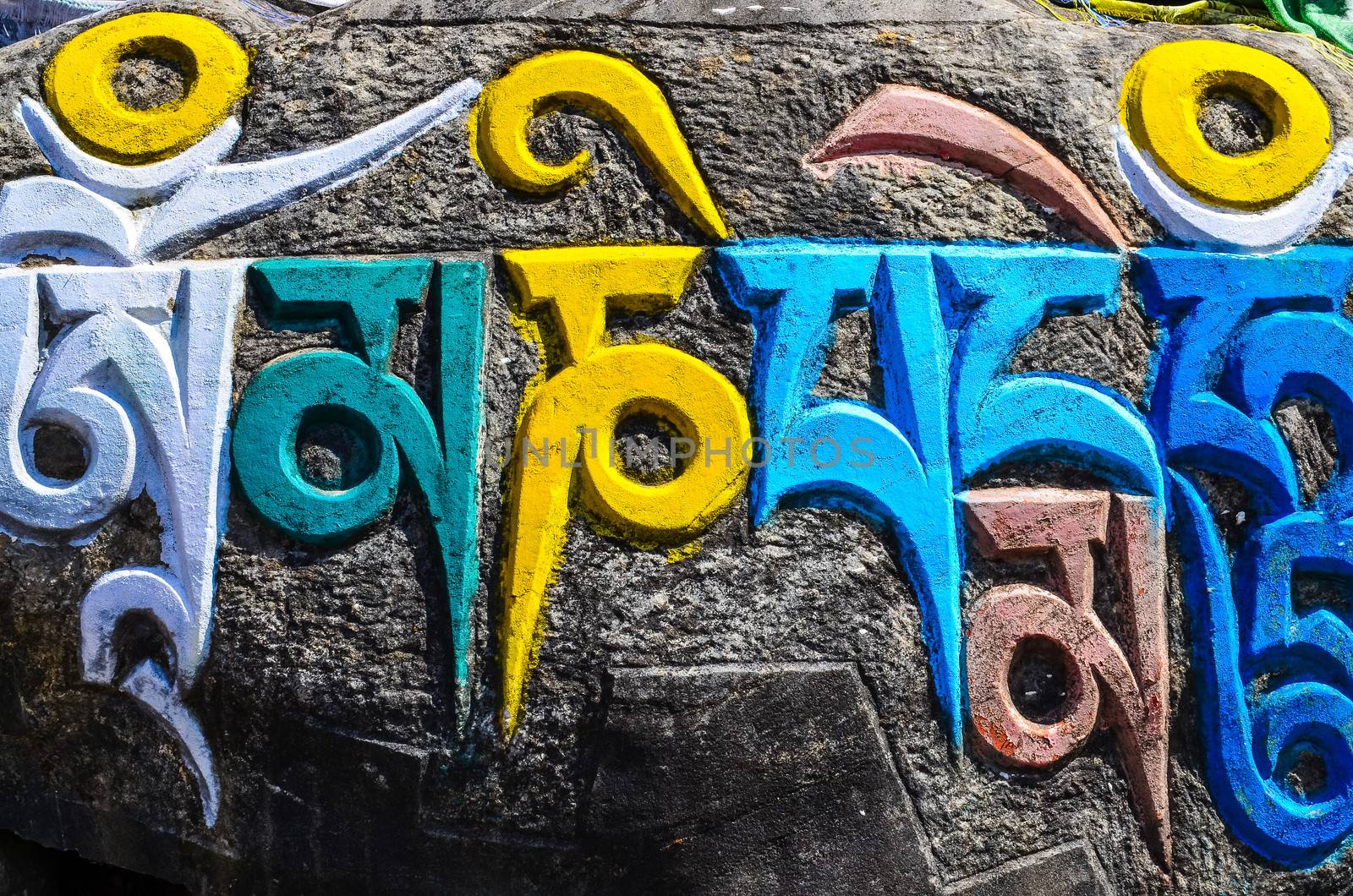 Tibetan buddhist religious symbols carved on stones, Nepal