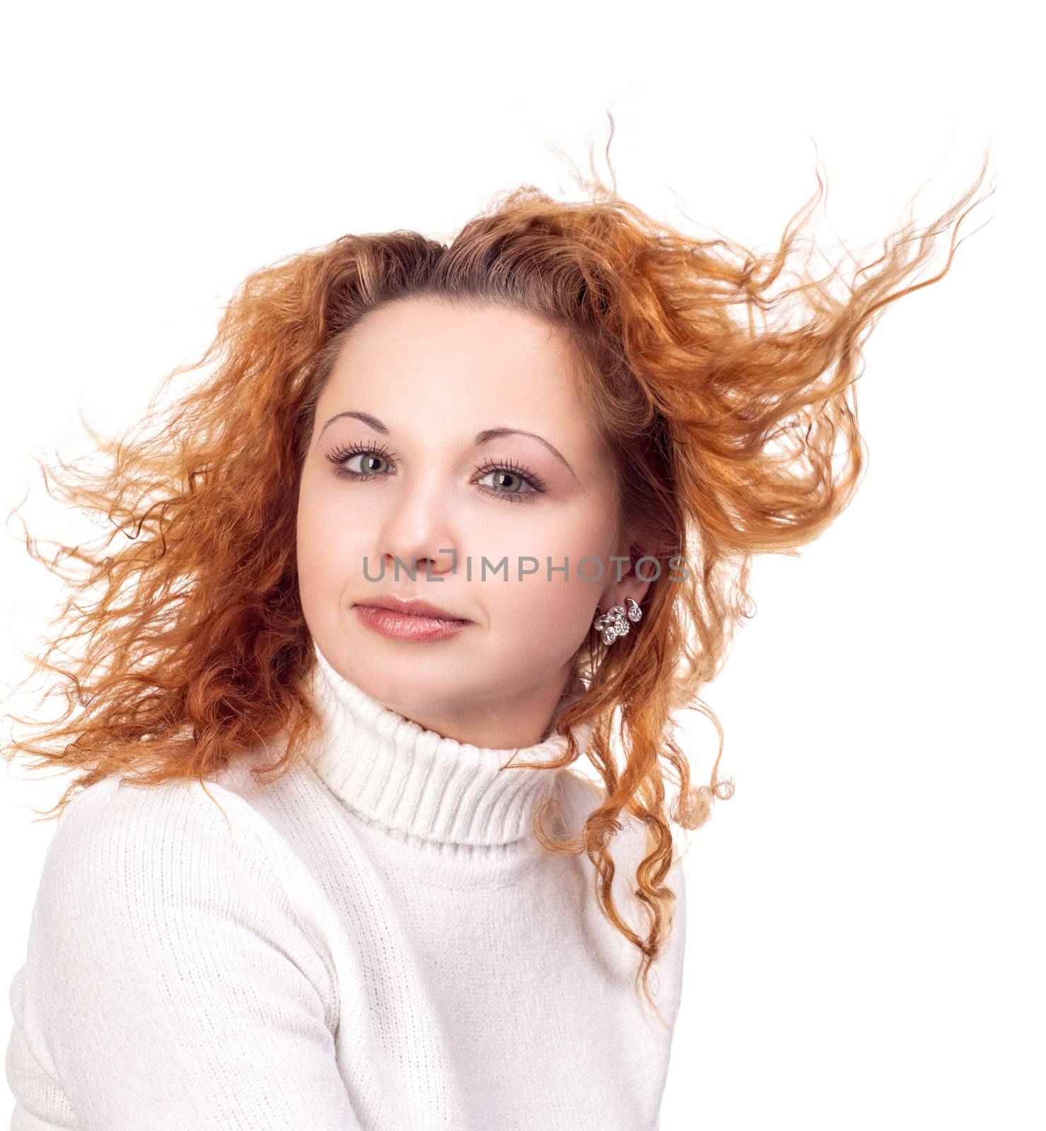Young attractive girl with flying hair