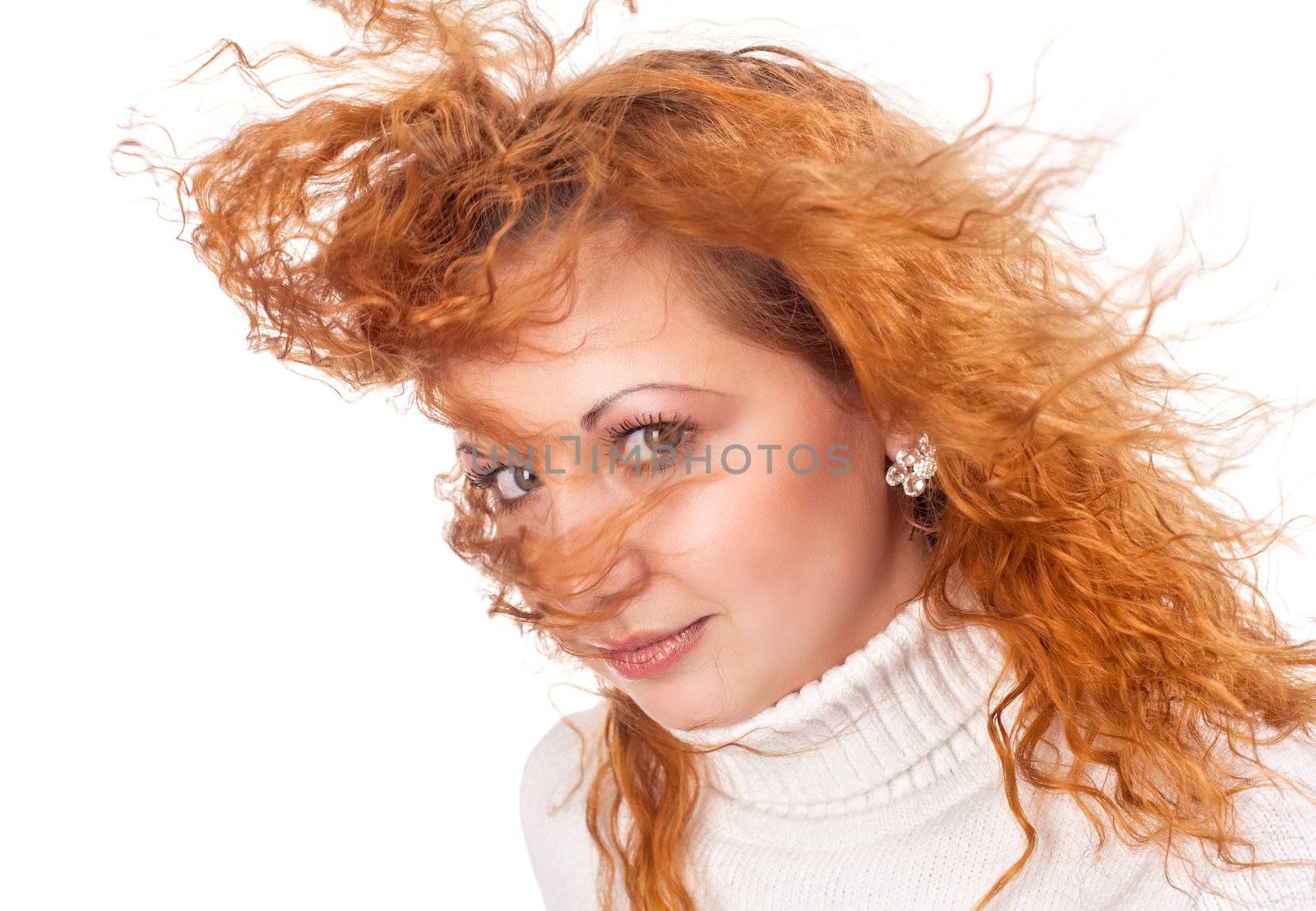 Young attractive girl with flying hair