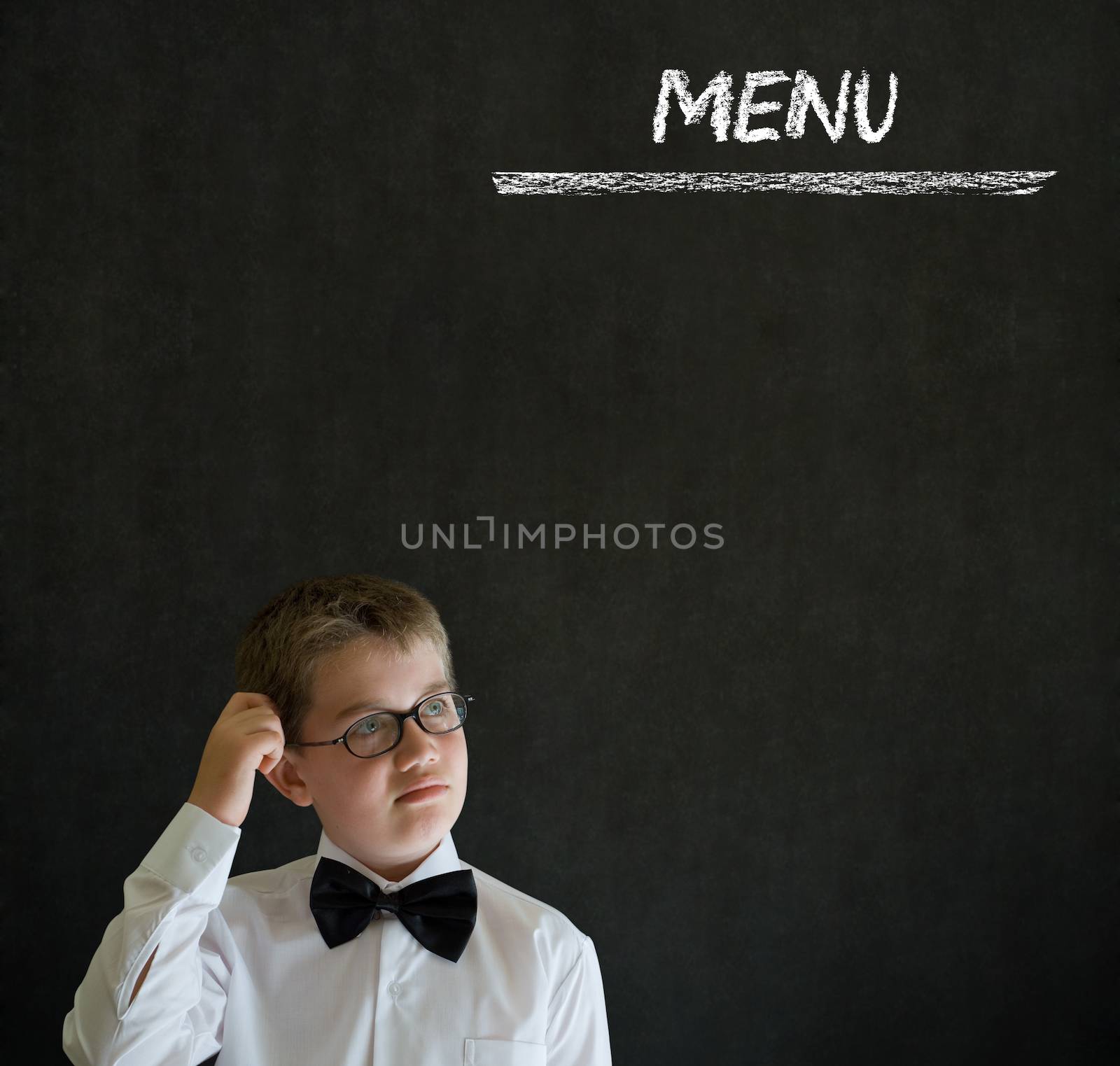 Thinking boy business man with chalk menu on blackboard background