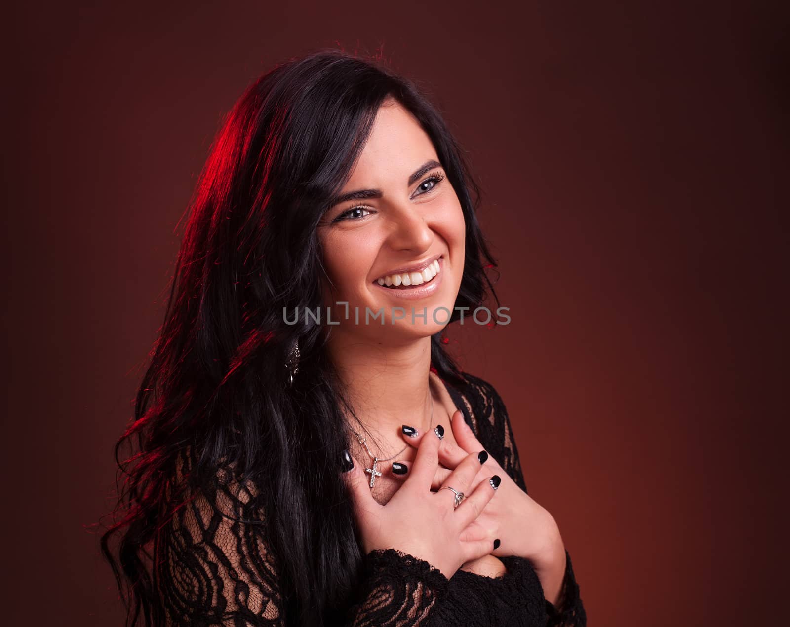 young woman smiling with folded arms by palinchak