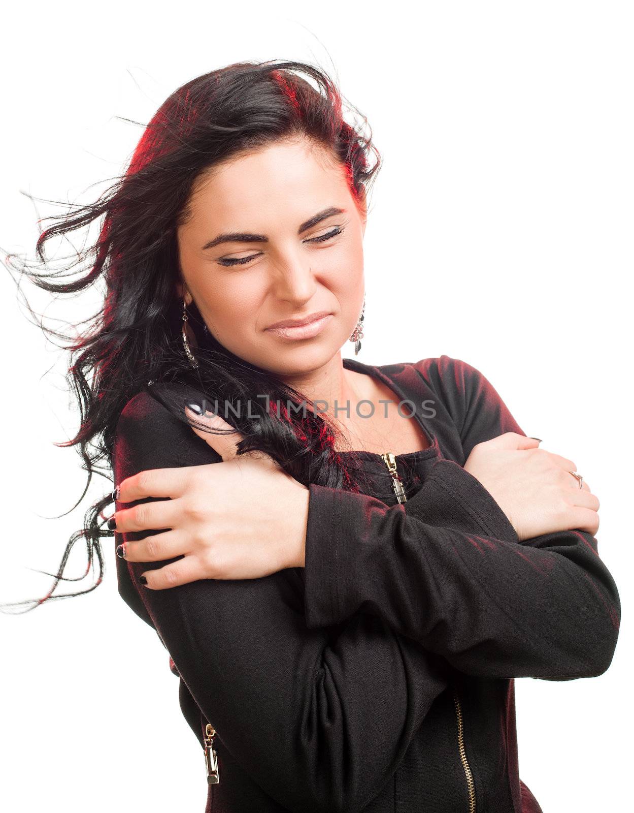 Young girl portrait on cold wind on white background