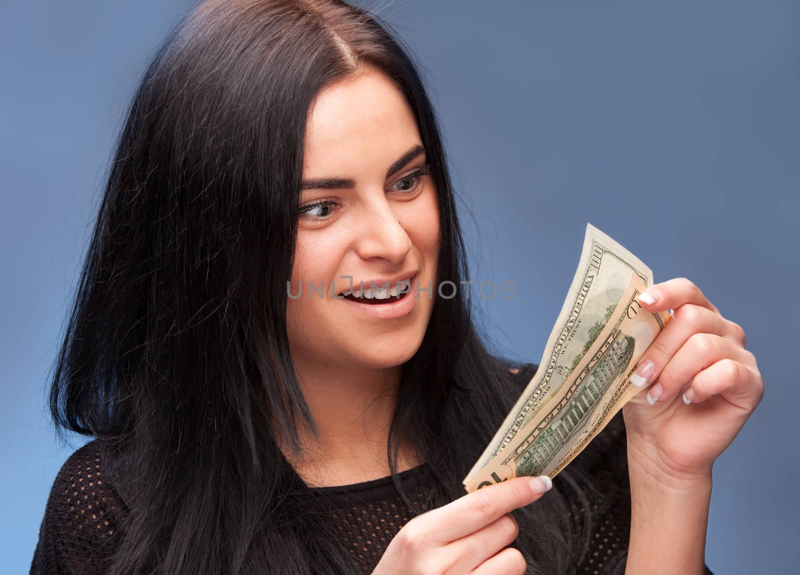 surprised woman with dollar bills by palinchak