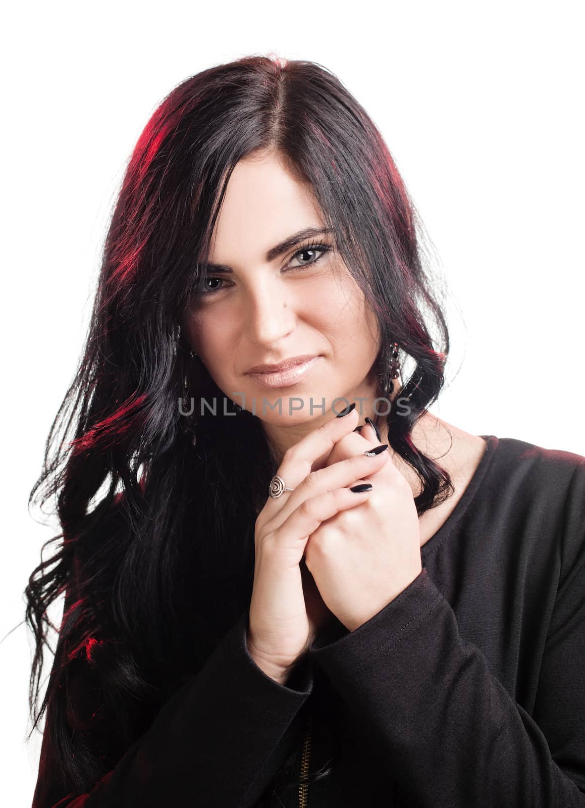 Portrait of a thoughtful young woman isolated on white