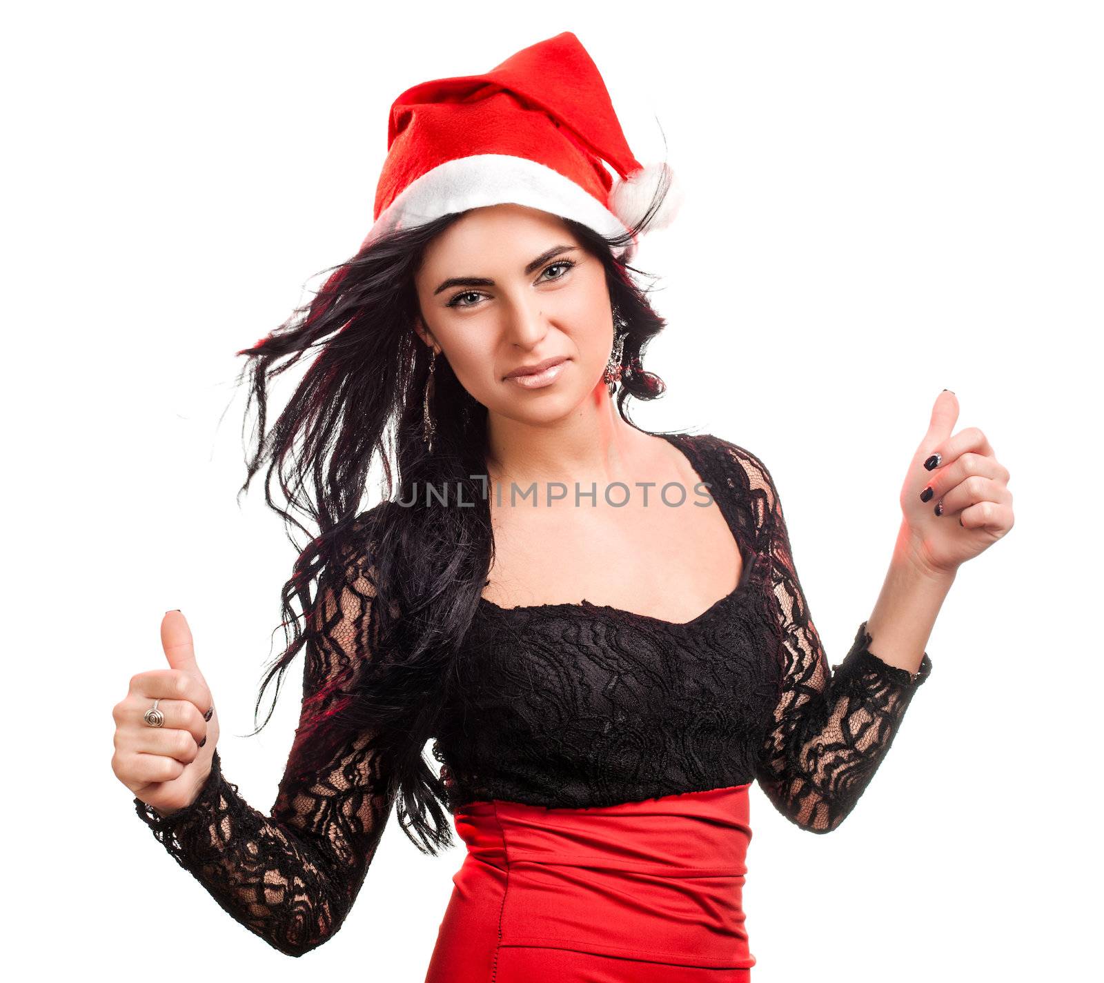 Portrait of joyful pretty woman in red santa claus hat