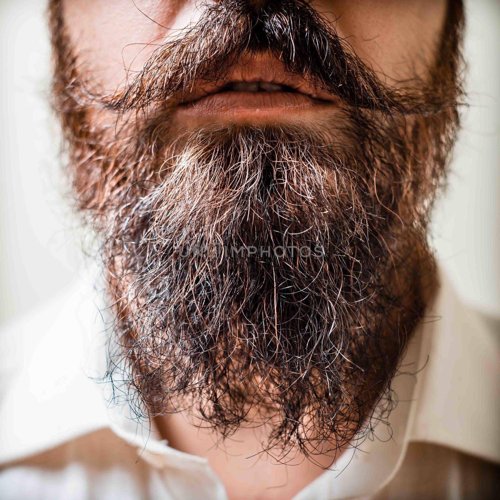 Close up of long beard and mustache man with white shirt