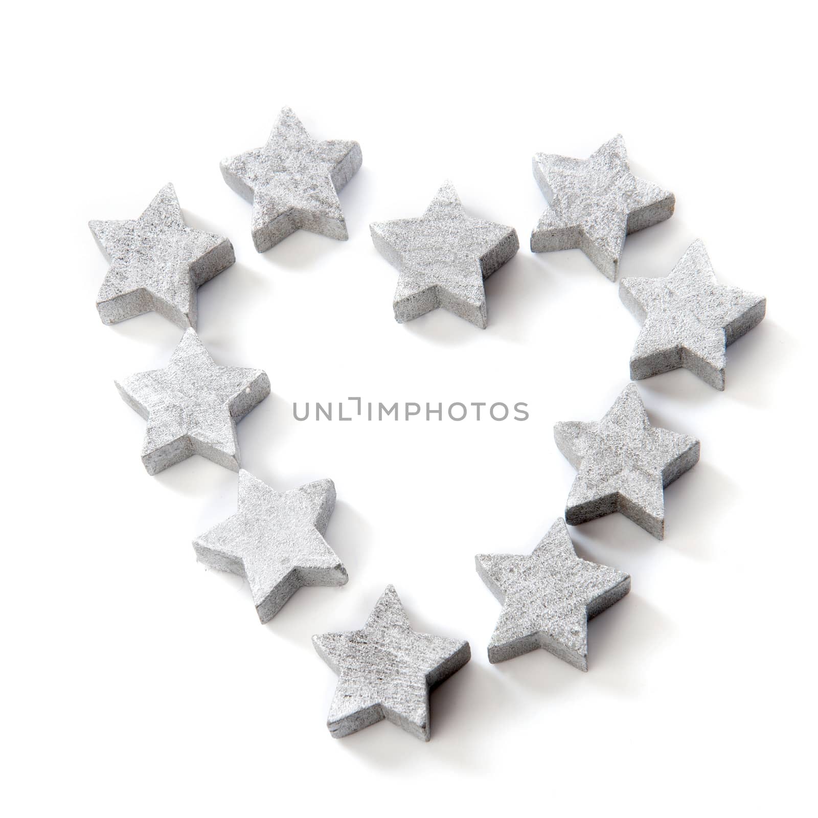 silver stars for christmas in the shape of a heart