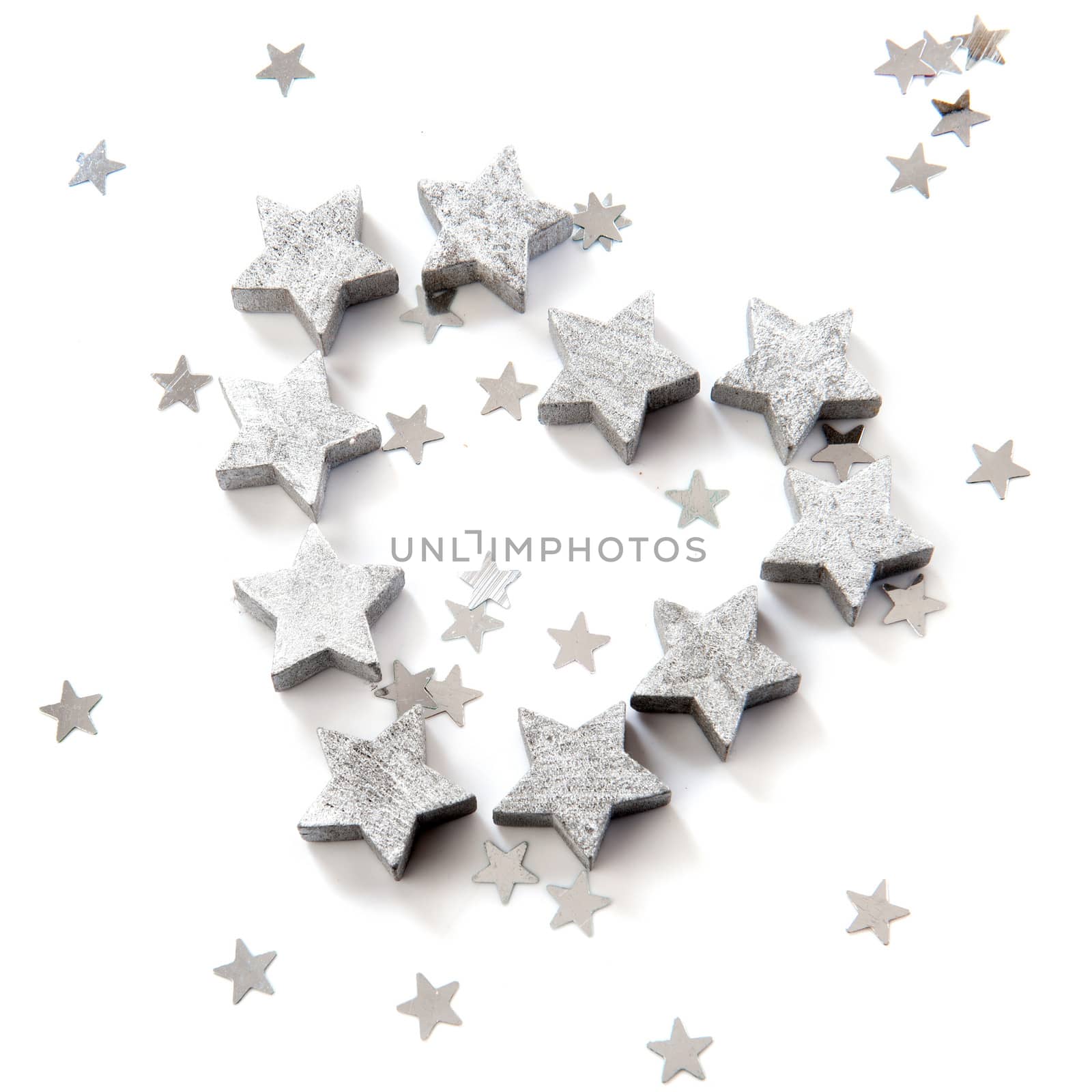silver stars for christmas in the shape of a heart