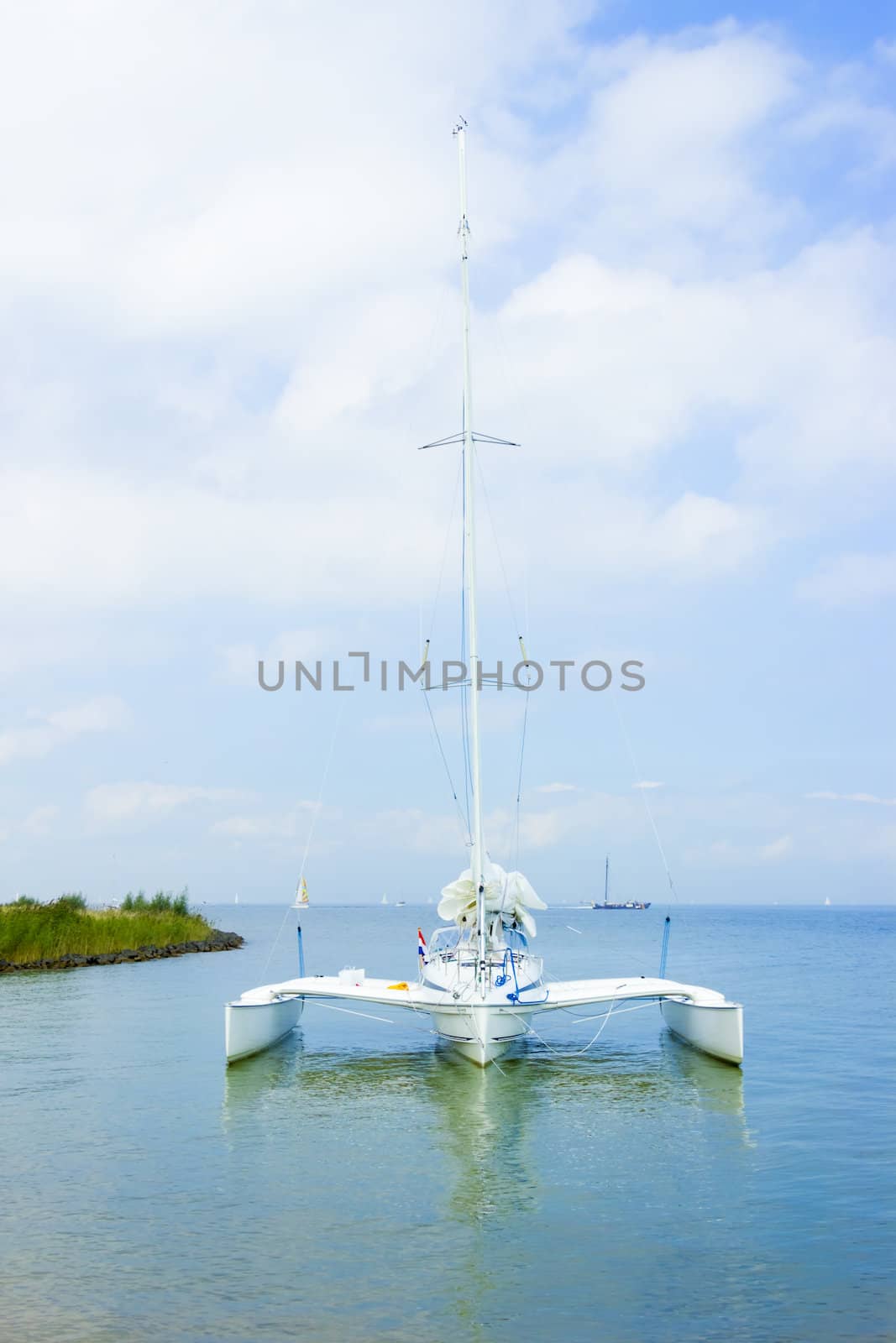 The road to lighthouse, Marken, the Netherlands by Tetyana