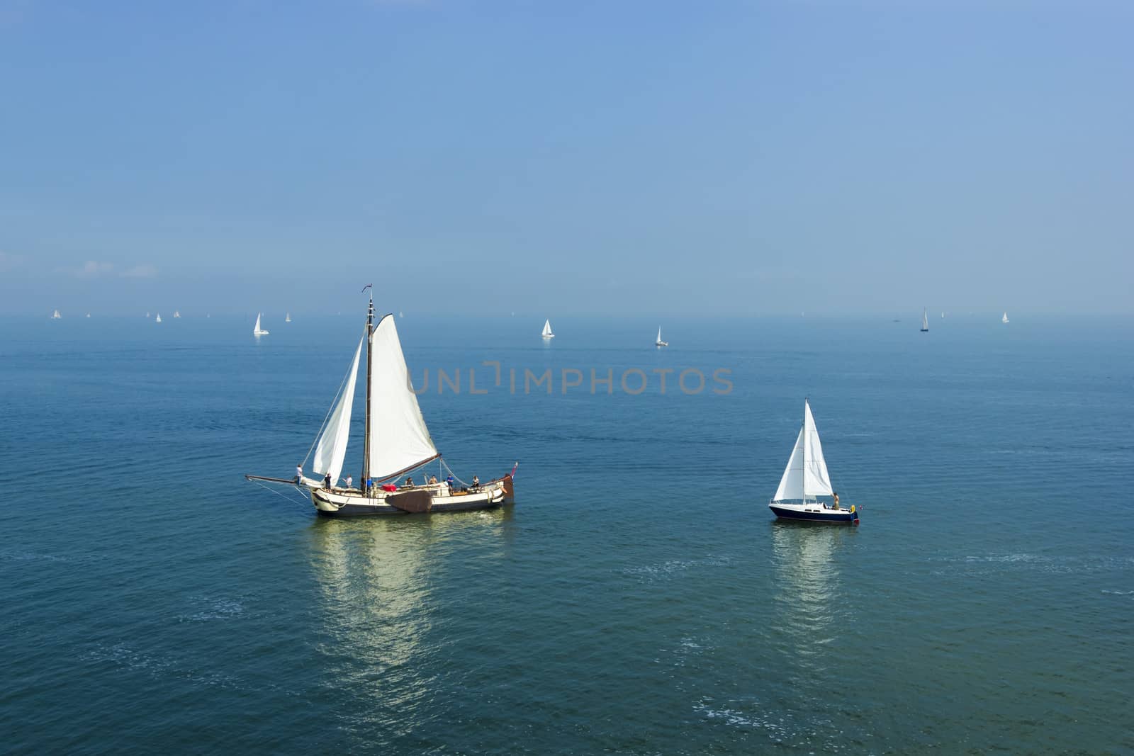 Seascape with big and small sailboats  by Tetyana