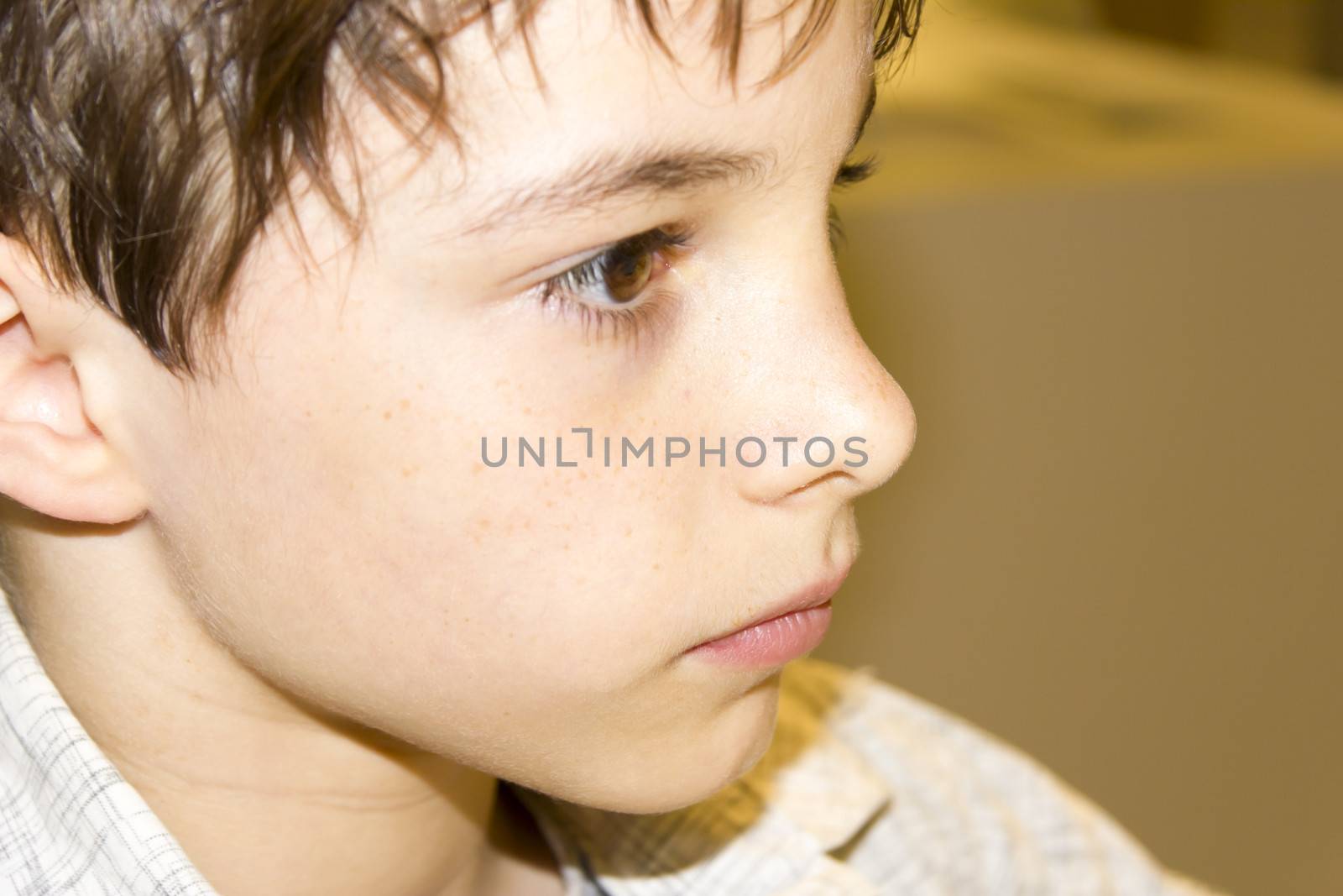 portrait of a cute young boy closeup by Tetyana