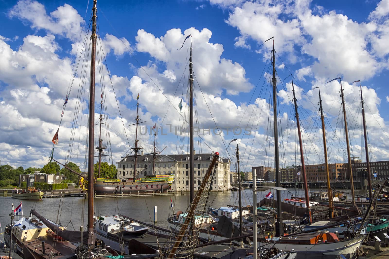 many ships parked near the shore in Amsterdam