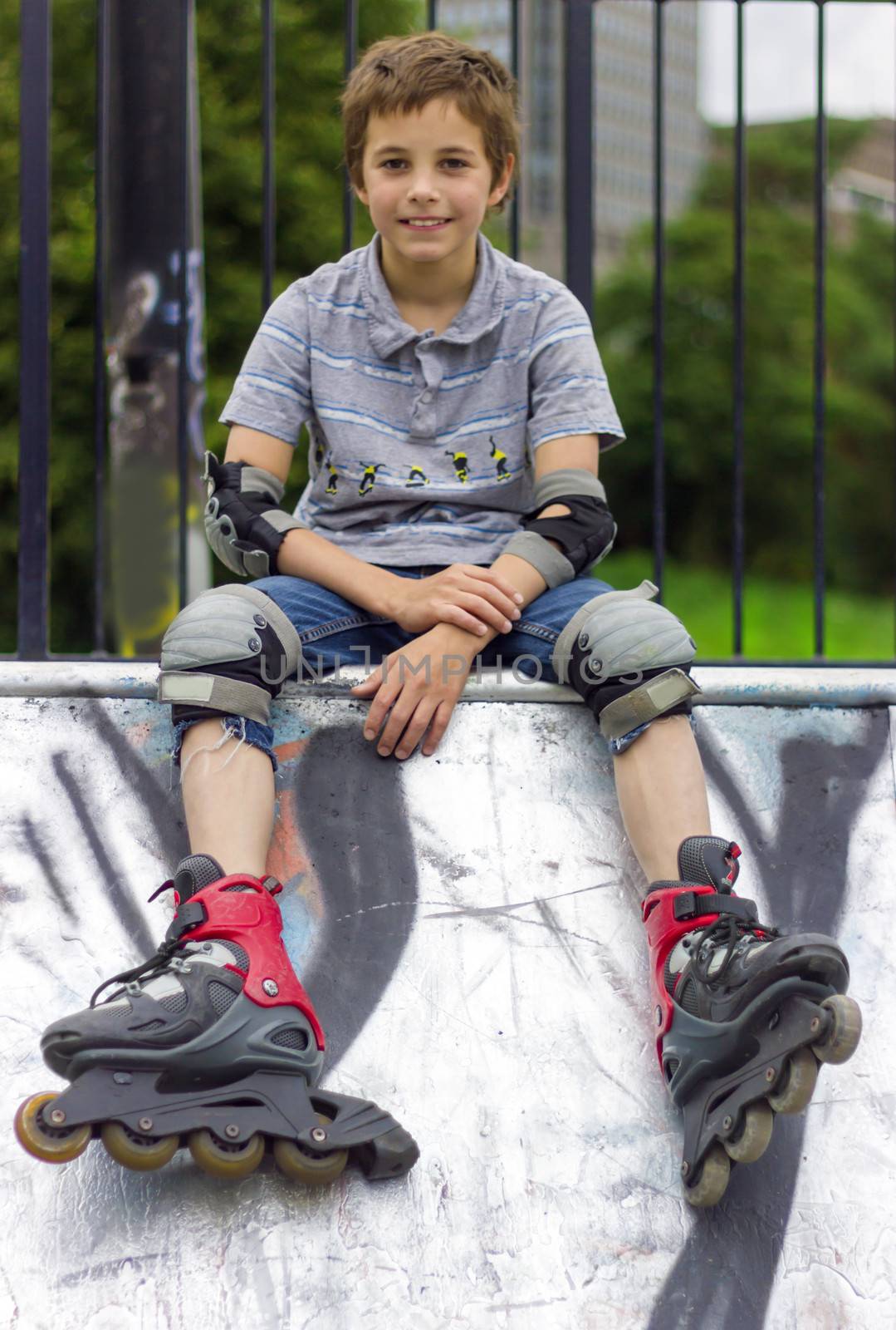 Portrait of roller-skater in protection kit