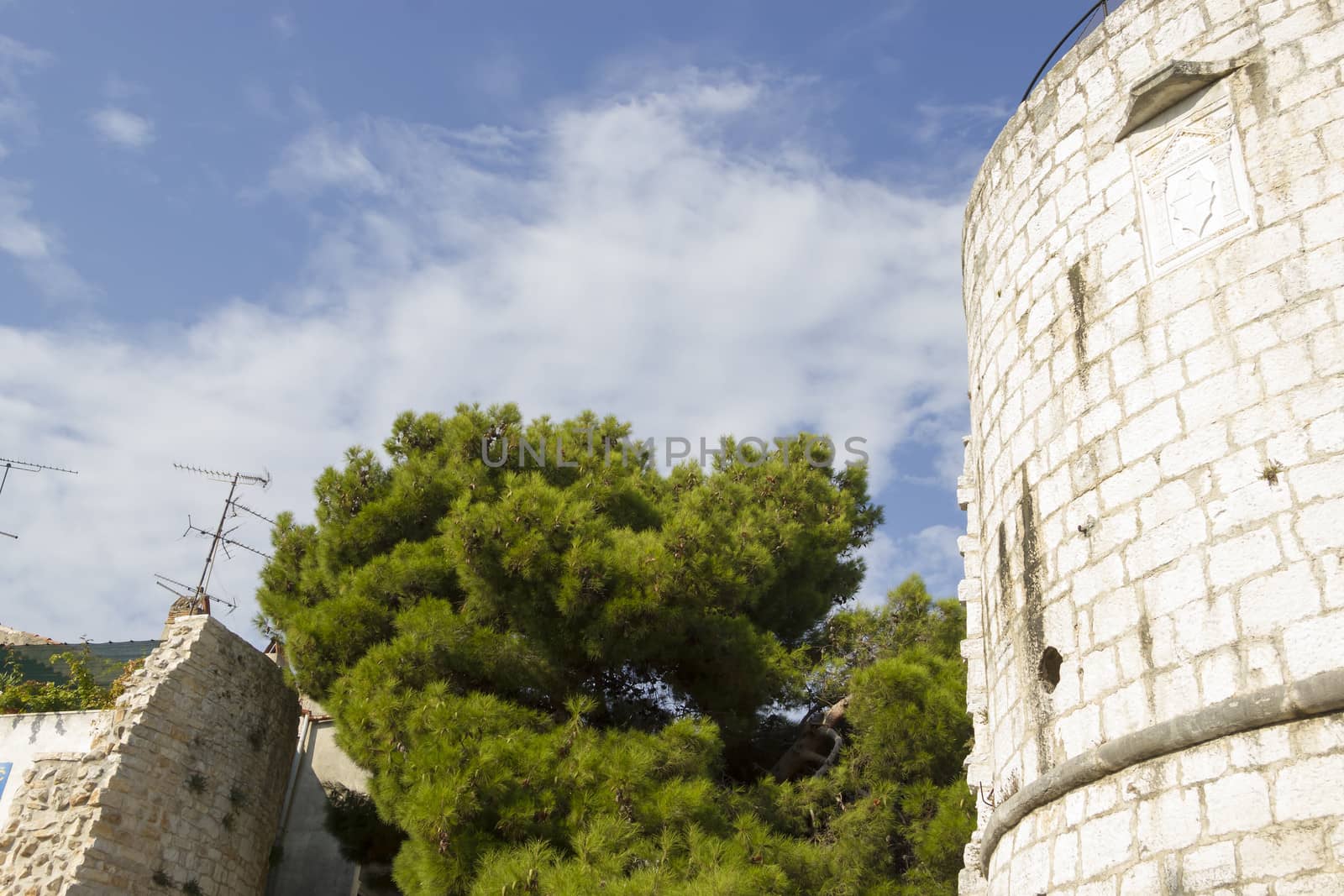 medieval tower in Porec, Croatia by Tetyana