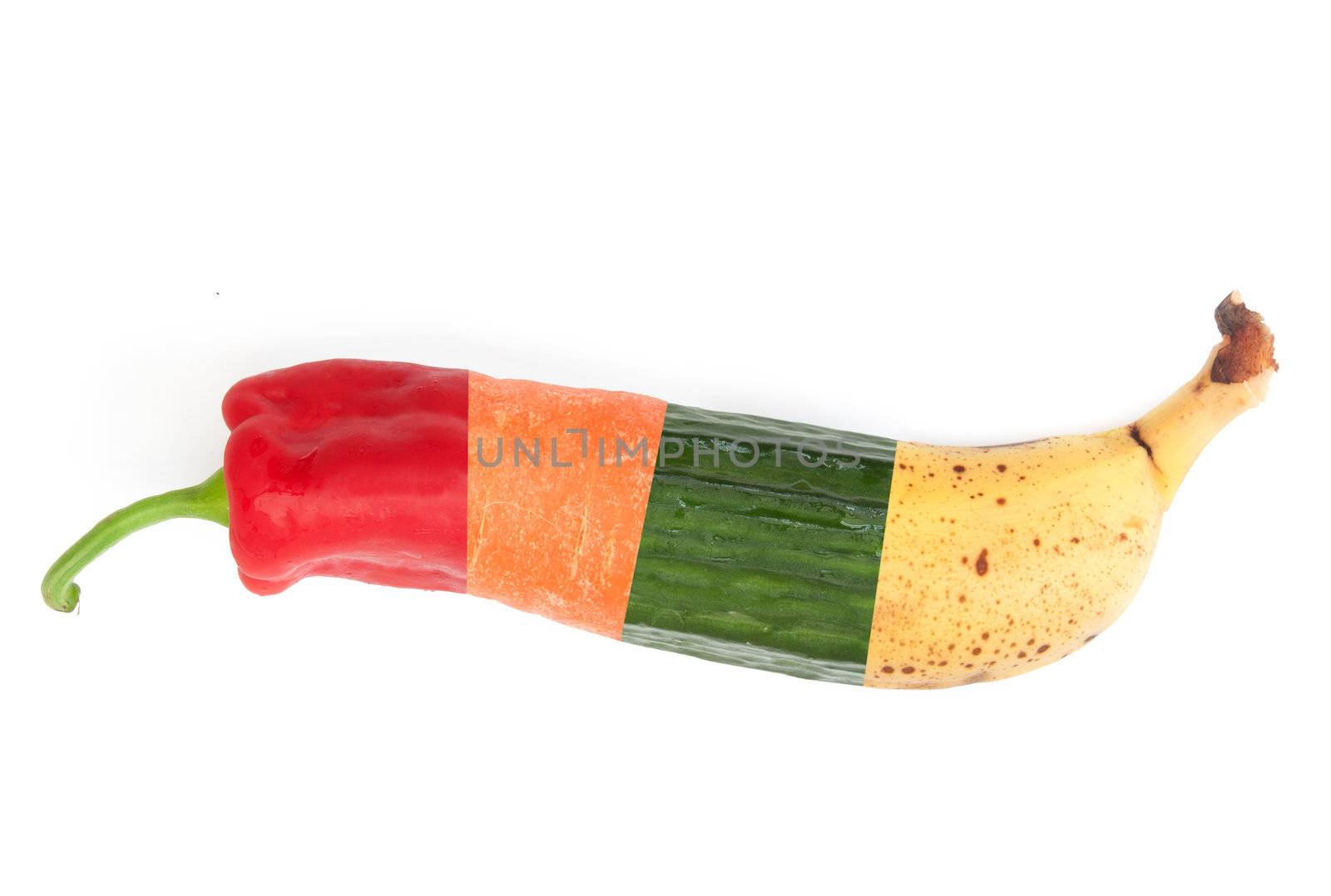 Carrot, cucumber, banana and red pepper combined into one piece 