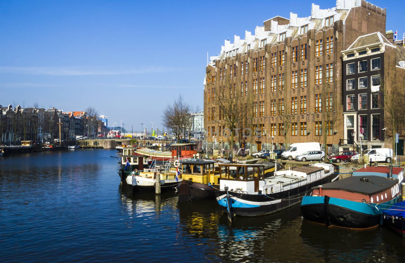 Classical Amsterdam view on a canal, the Netherlands by Tetyana