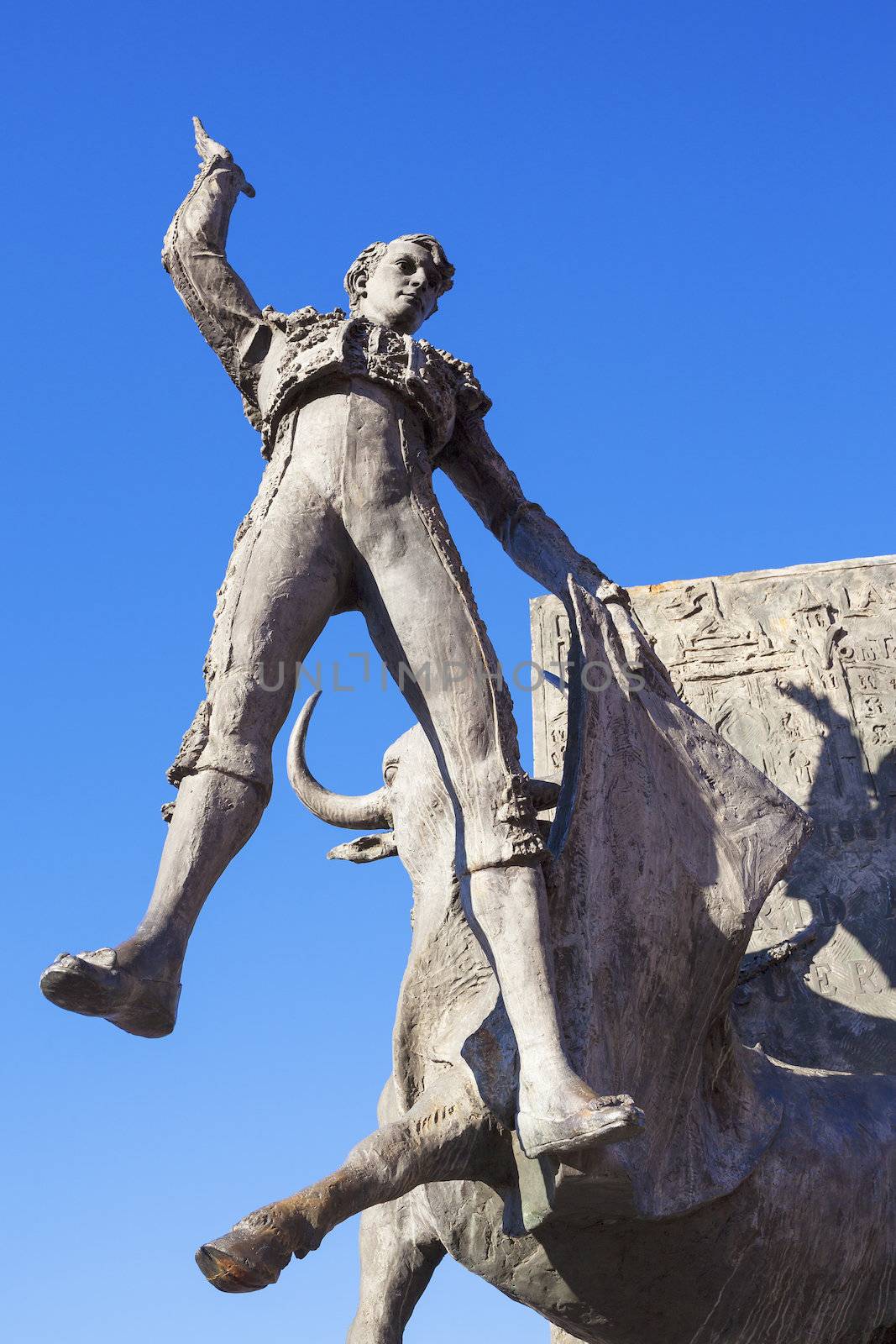 Bullfighter sculpture in front of Bullfighting arena Plaza de Toros de Las Ventas in Madrid