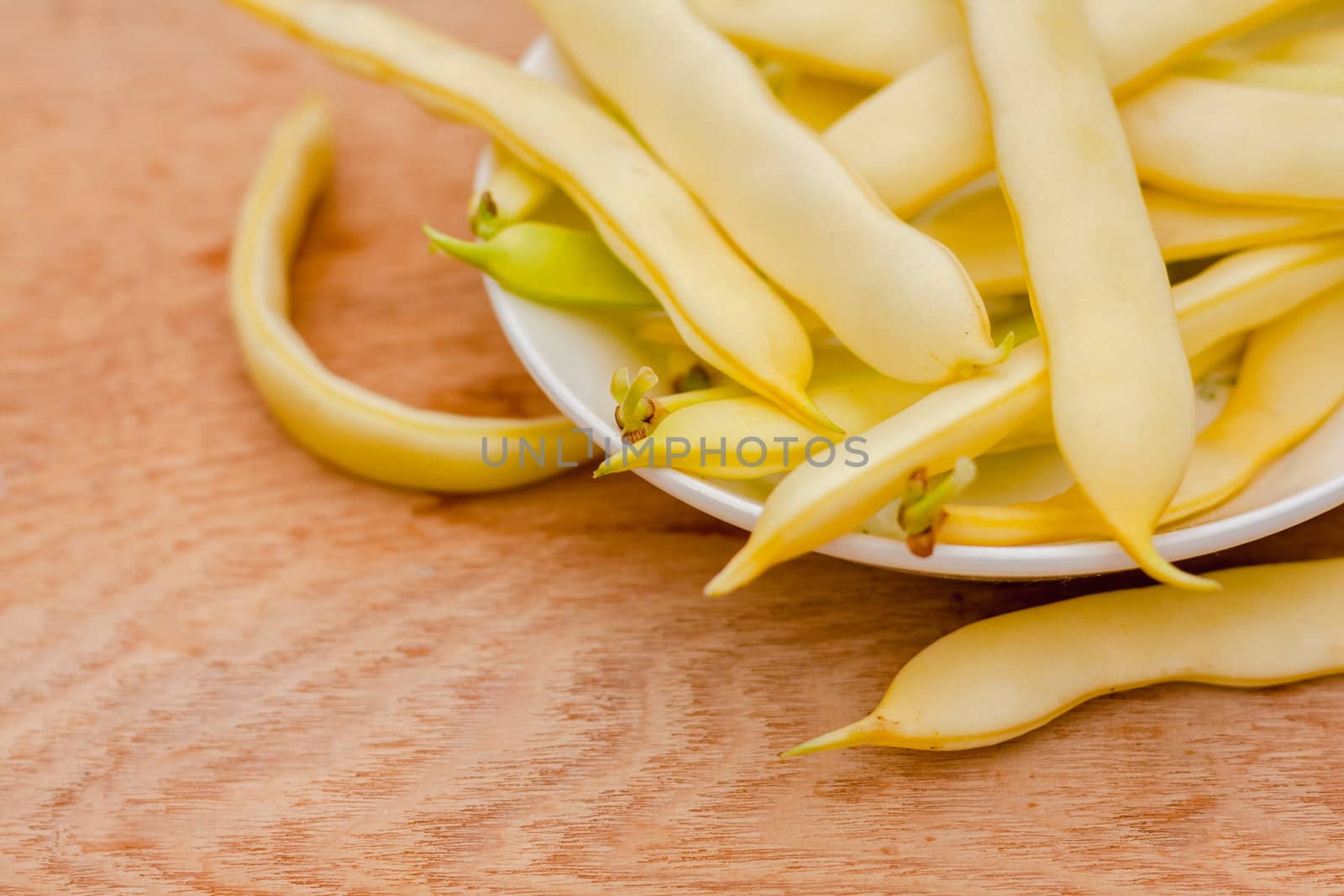 Fresh Yellow Kidney Beans In A Bowl Board Over Wood Background