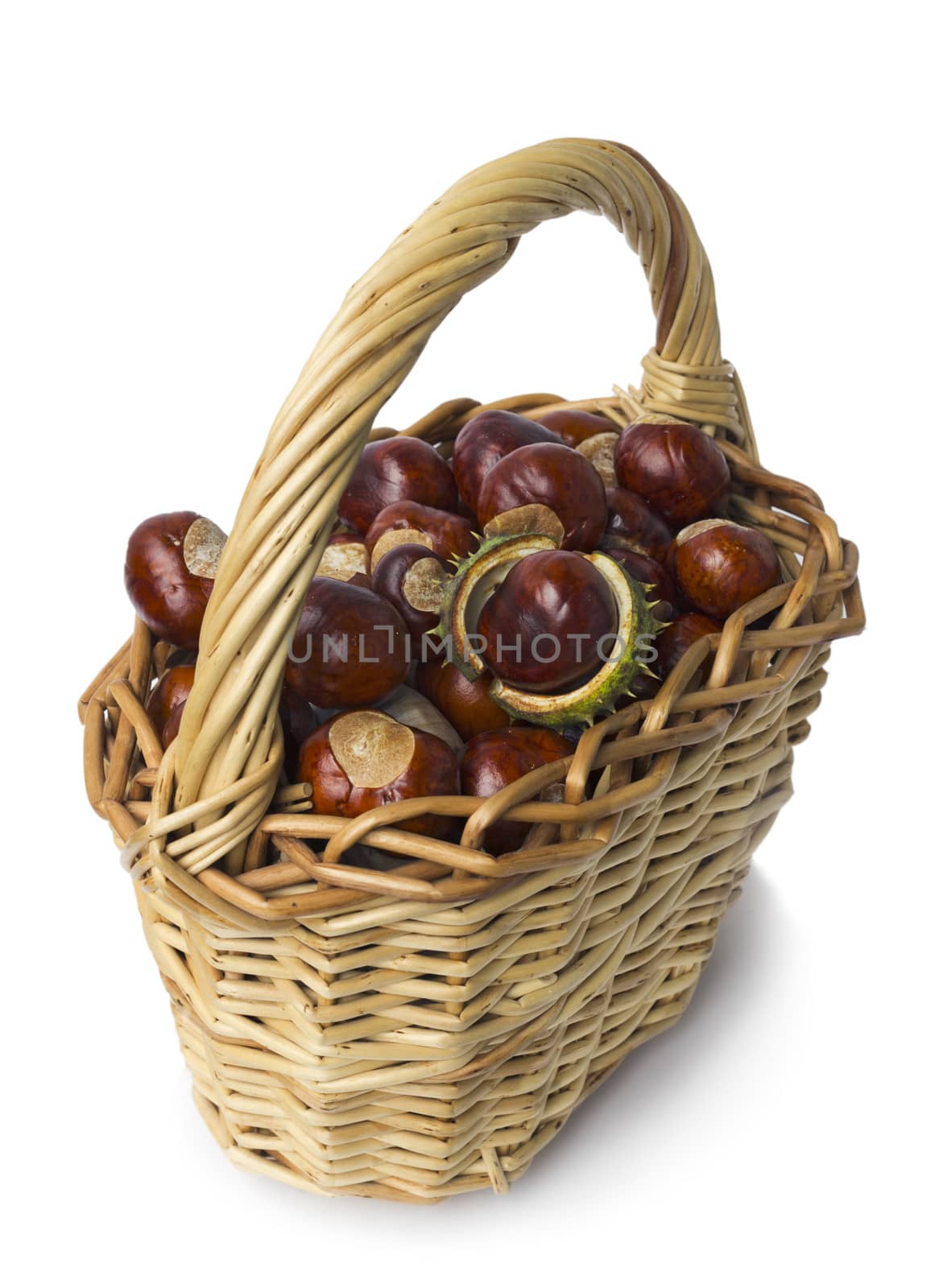 Basket of chestnut on a white background